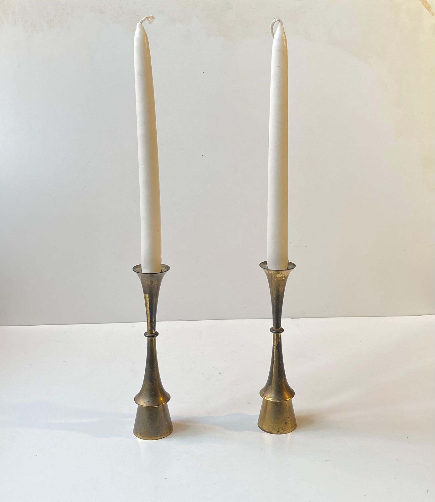 A Pair Of Jens Harald Quistgaard Candlesticks In Patinated Brass, 1960s photo vinterior