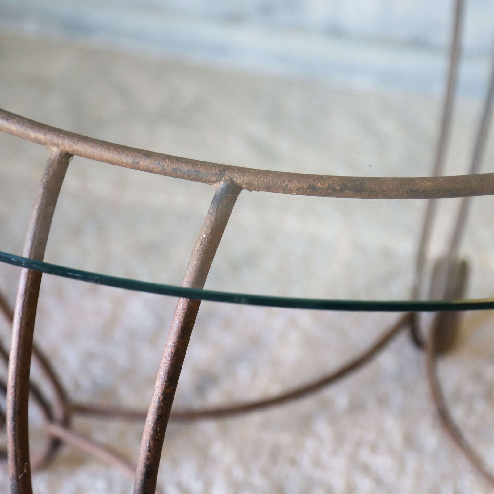 Stylish Mid Century Circular Table With Bevelled Glass Top And Decorative Metal Base photo Furniture