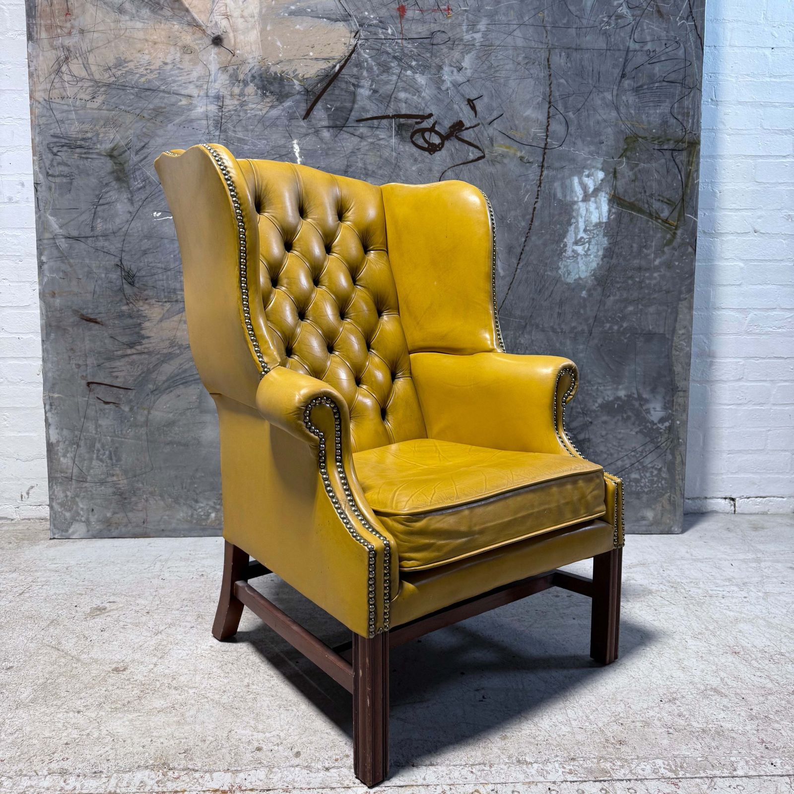 Vintage Leather Chesterfield Wing Chair In Soft Lemon