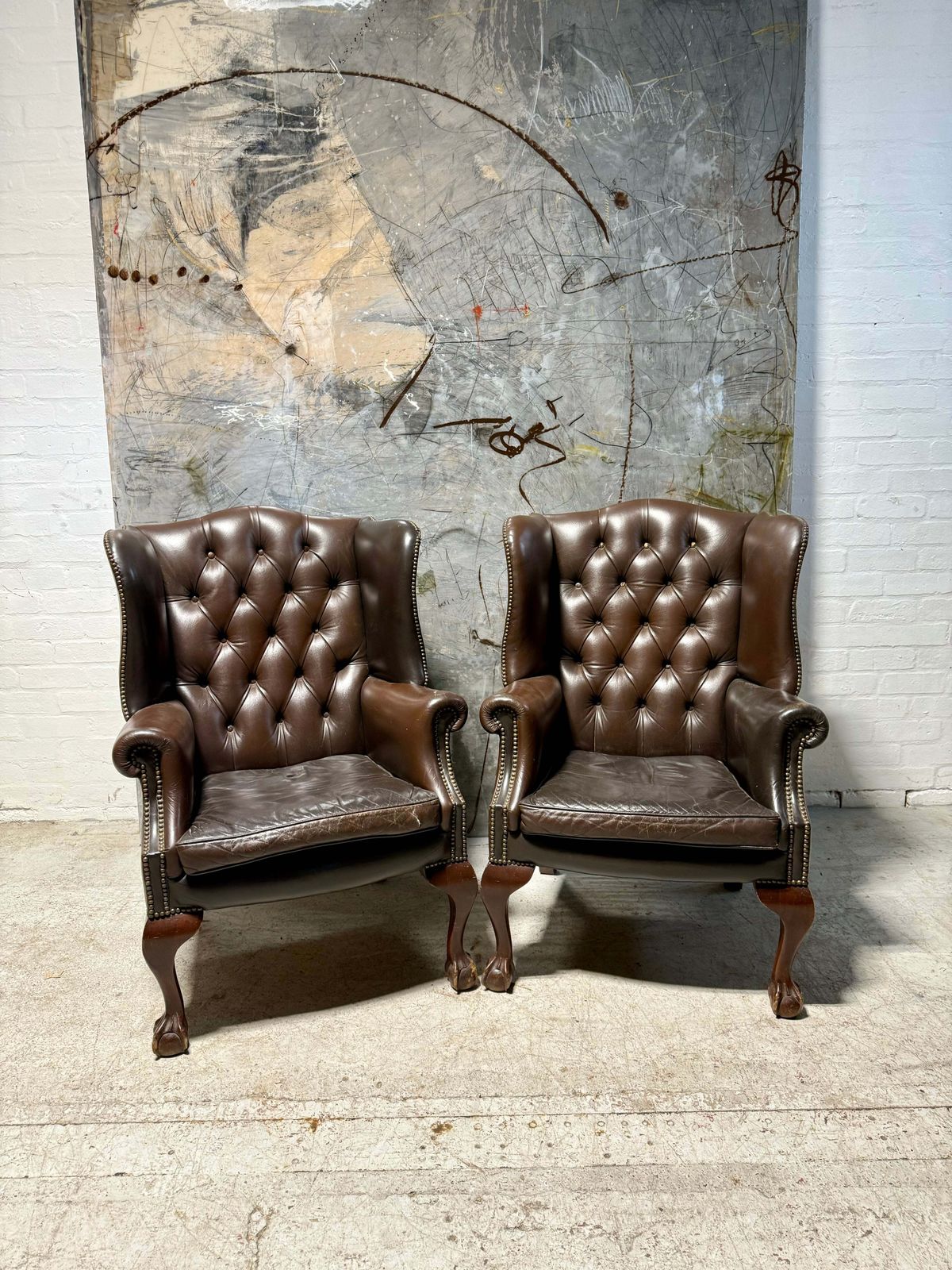 A Matching Pair Of Midc Vintage Gentleman’s Wing Back Chairs In Leather photo furniture