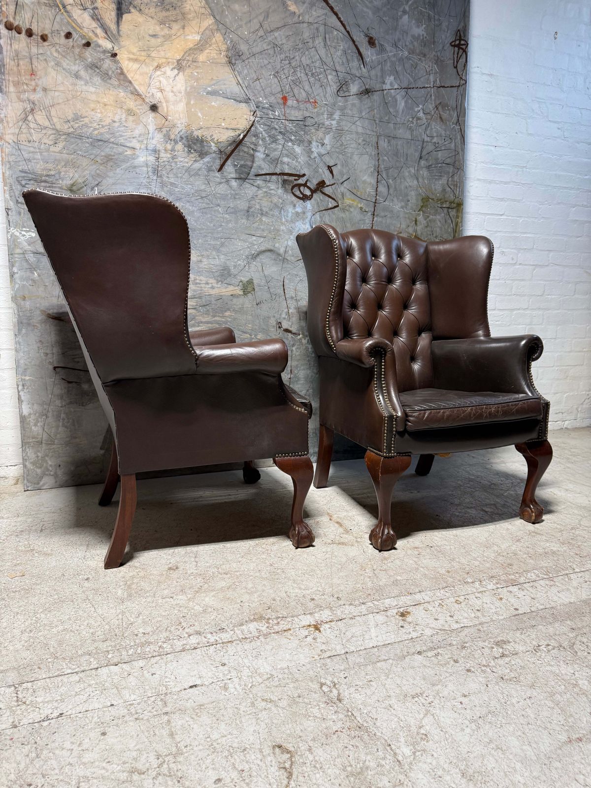 A Matching Pair Of Midc Vintage Gentleman’s Wing Back Chairs In Leather photo for sale
