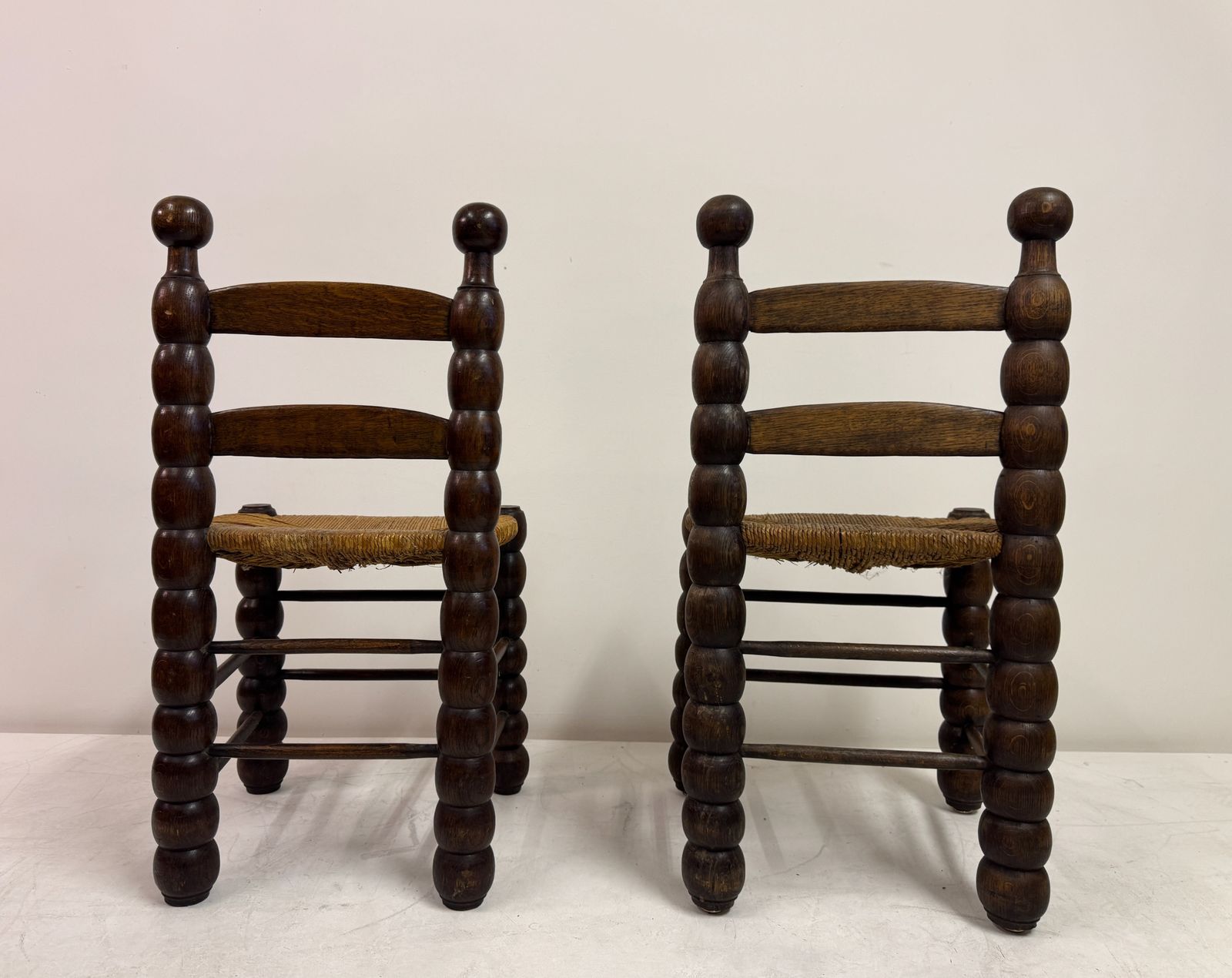 photo for sale Pair Of French Turned Wood Chairs With Rush Seats, In The Style Of Charles Dudouyt, 1940s