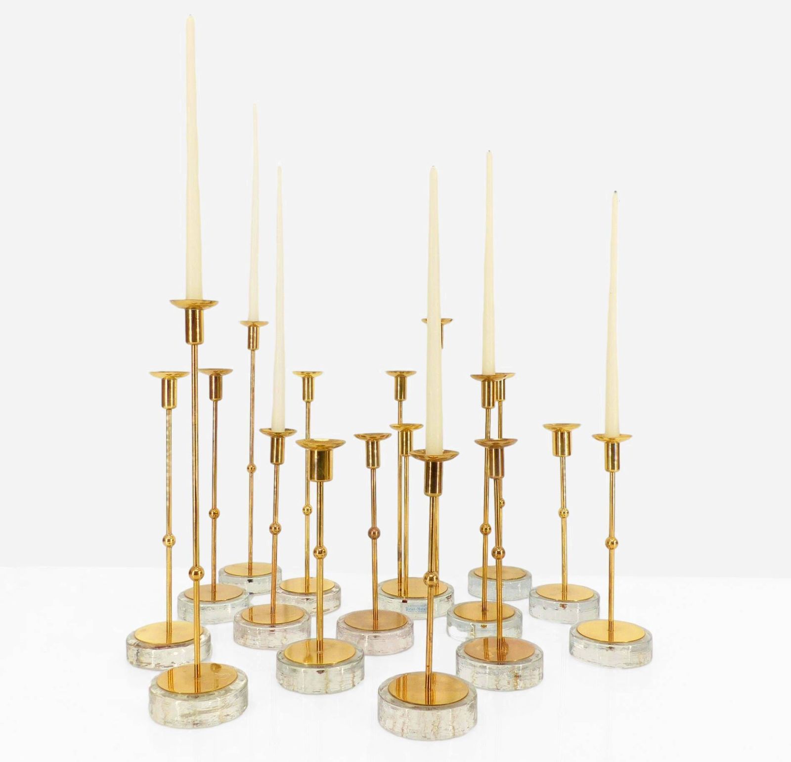 Set Of 15 Scandinavian Candlesticks In Brass And Glass, Gunnar Ander, Ystad Metall, Sweden 1960