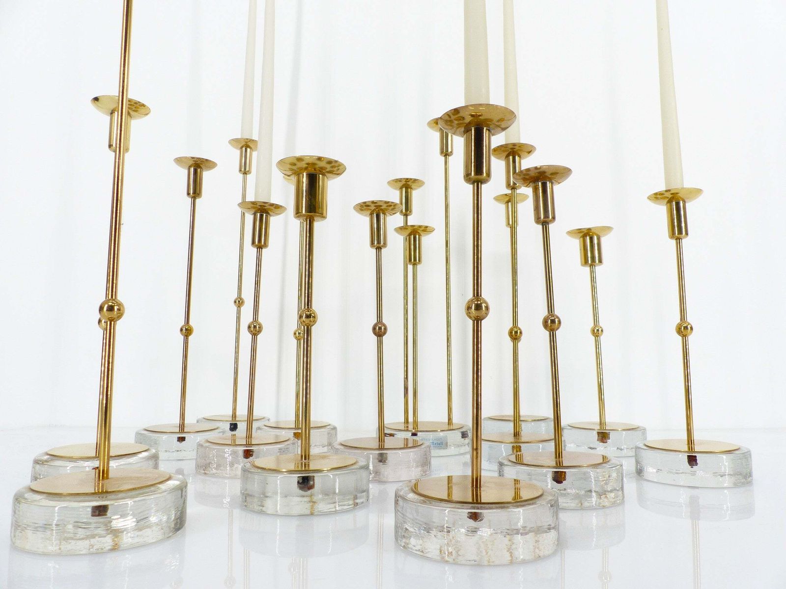 Set Of 15 Scandinavian Candlesticks In Brass And Glass, Gunnar Ander, Ystad Metall, Sweden 1960 photo for sale
