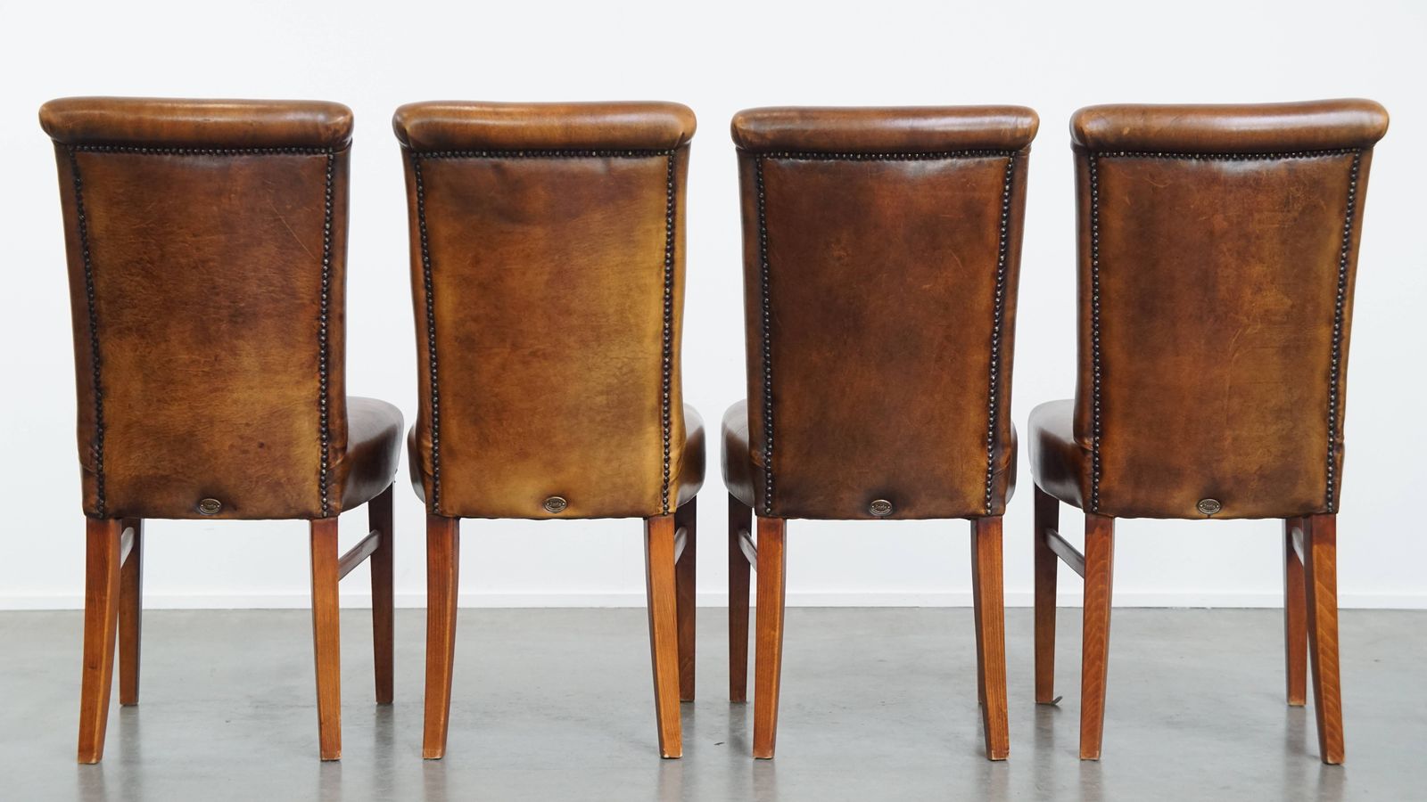 Timeless Set Of 4 Stately, Comfortable Dining Chairs Made Of Sheepskin With A Decorative Nail Finish photo Furniture