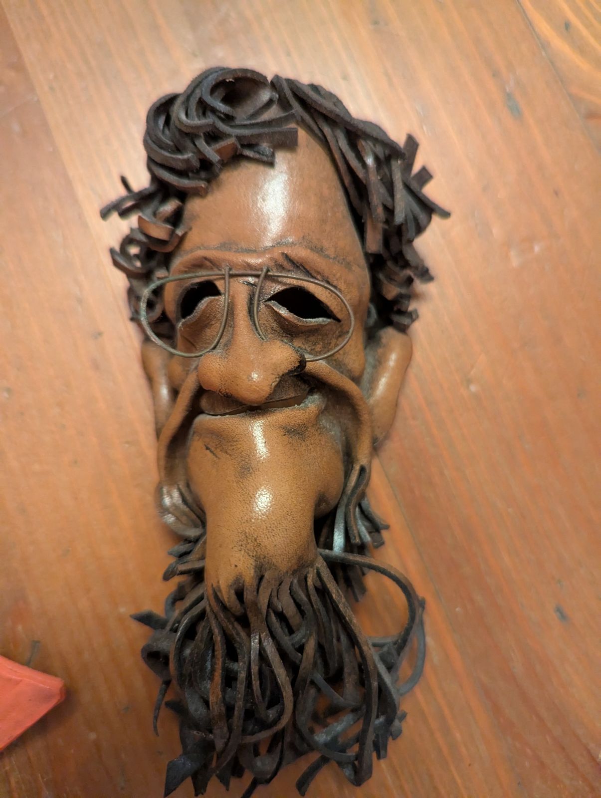 photo buy The Silent Council – Seven Sculptural Leather Faces By Tch Piel, Dominican Republic