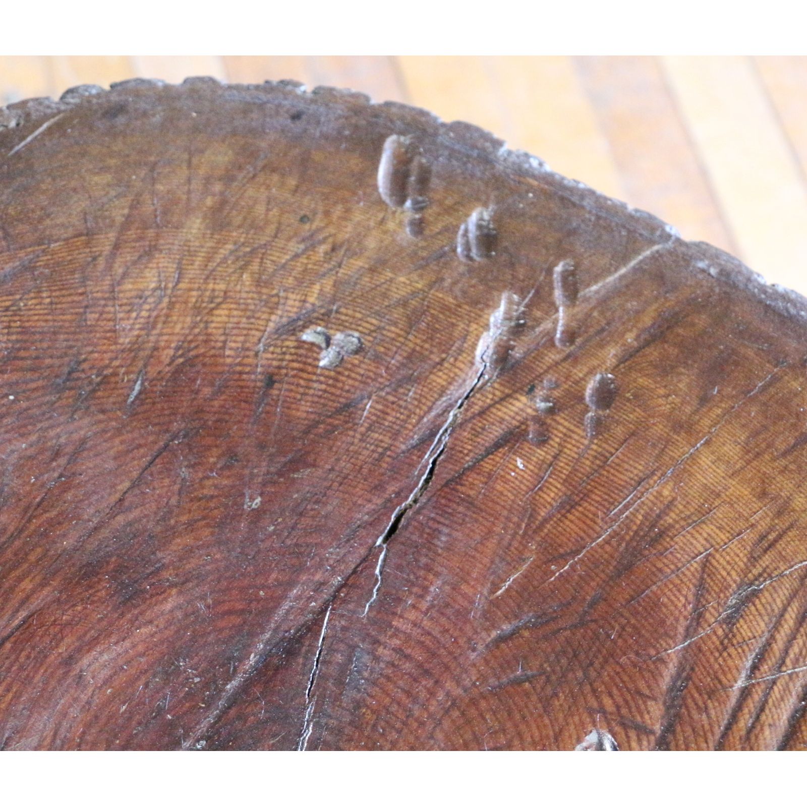 A Rustic Waxed And Polished Tree Slice Coffee Table With Live Edge And Hairpin Legs photo for sale