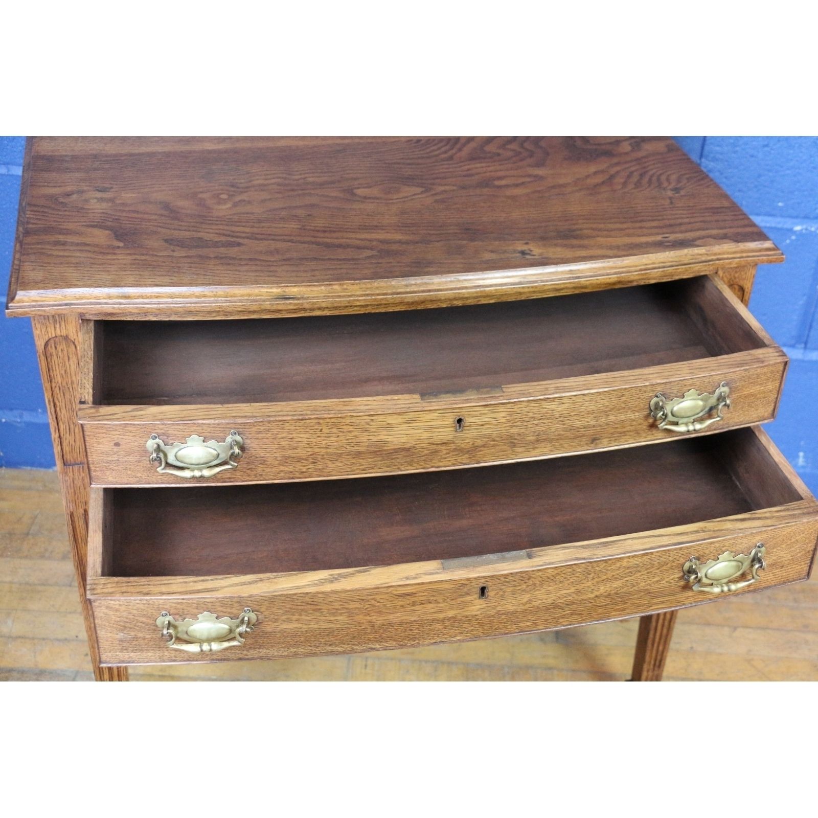 A Quality Oak Bow Fronted Two Drawer Side Table Raised On Tapering Spade Feet photo Furniture
