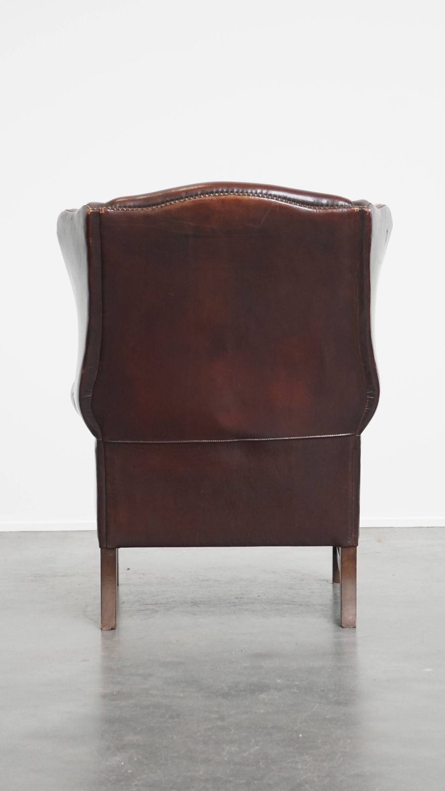 Luxurious, Classic And Comfortable Dark English Style Sheepskin Wing Chair With Lots Of Character And A Beautiful Patina photo Furniture