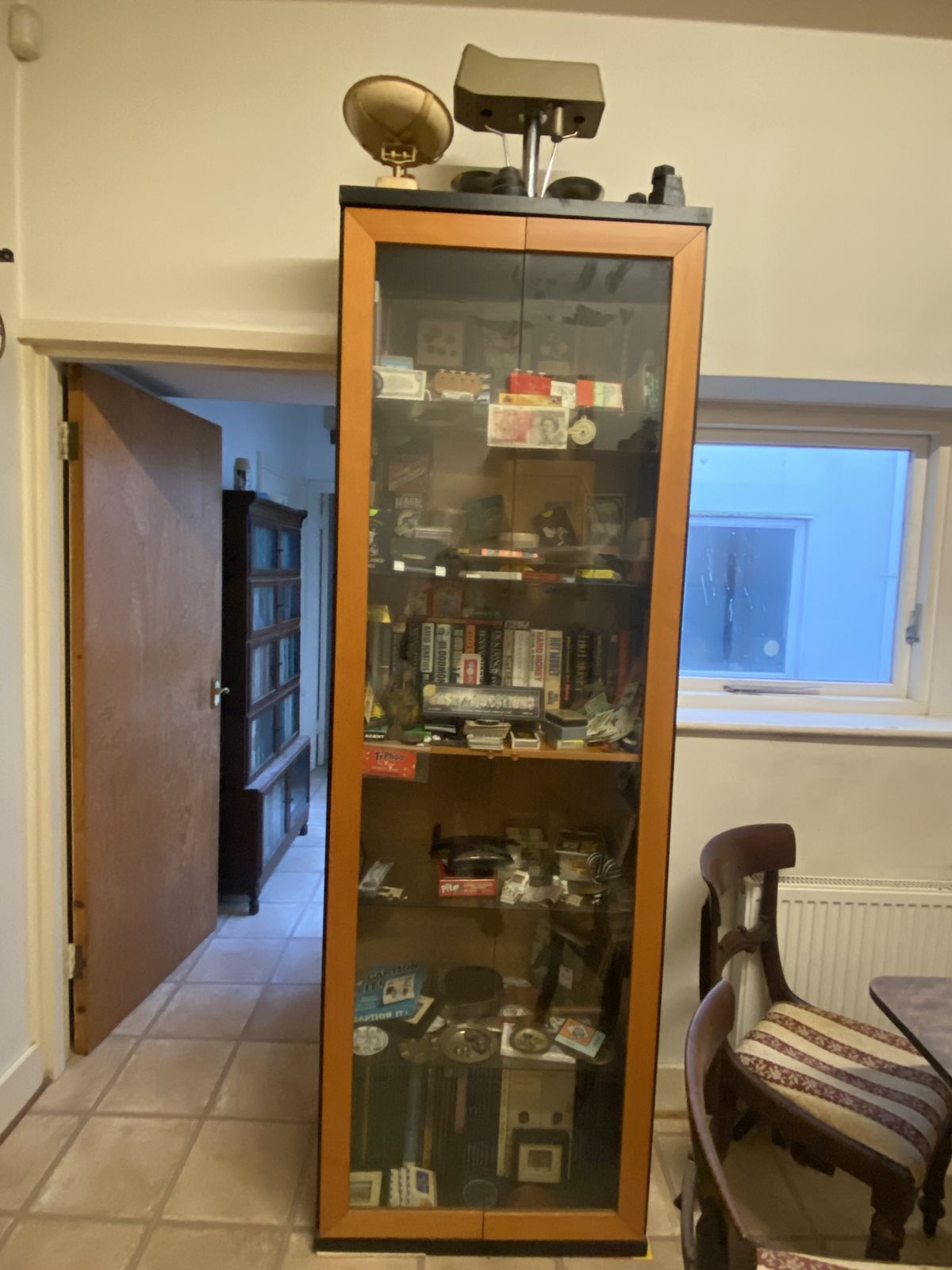 Display Cabinet (Large) Used To House Collectibles. Glass Doors. 7ft Tall.