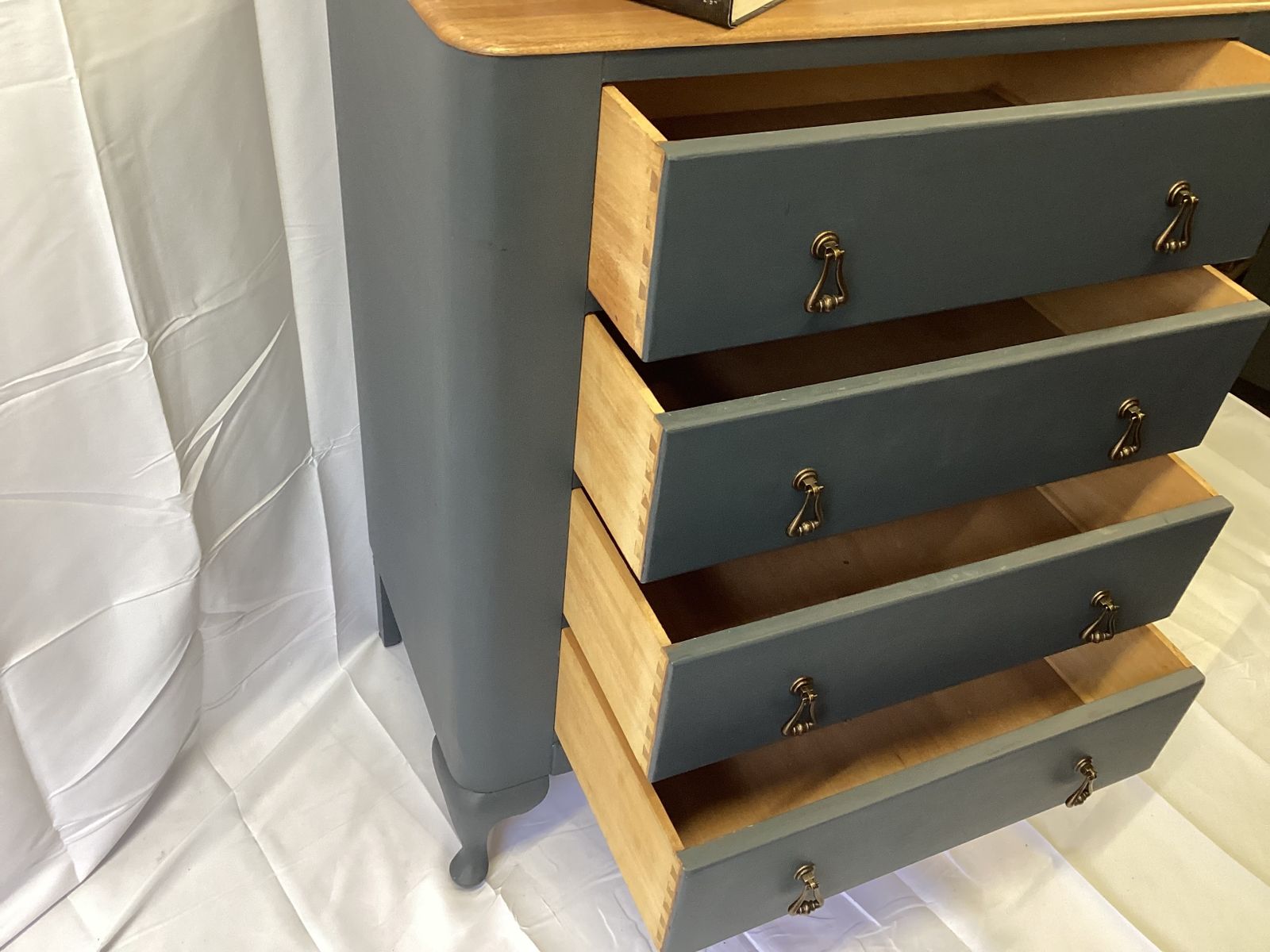 Vintage Lebus 4 Drawer Chest By Lebus Furniture With A Natural Wood Top And Brass Drop Handles photo furniture