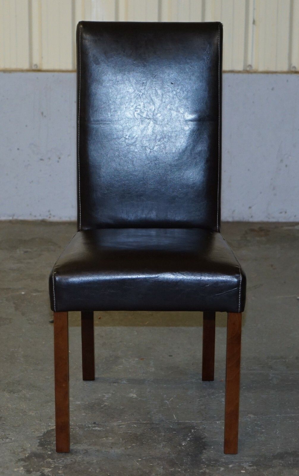 photo furniture Suite Of Six Bicast Leather Contemporary Dining Chairs With Custom Made Covers