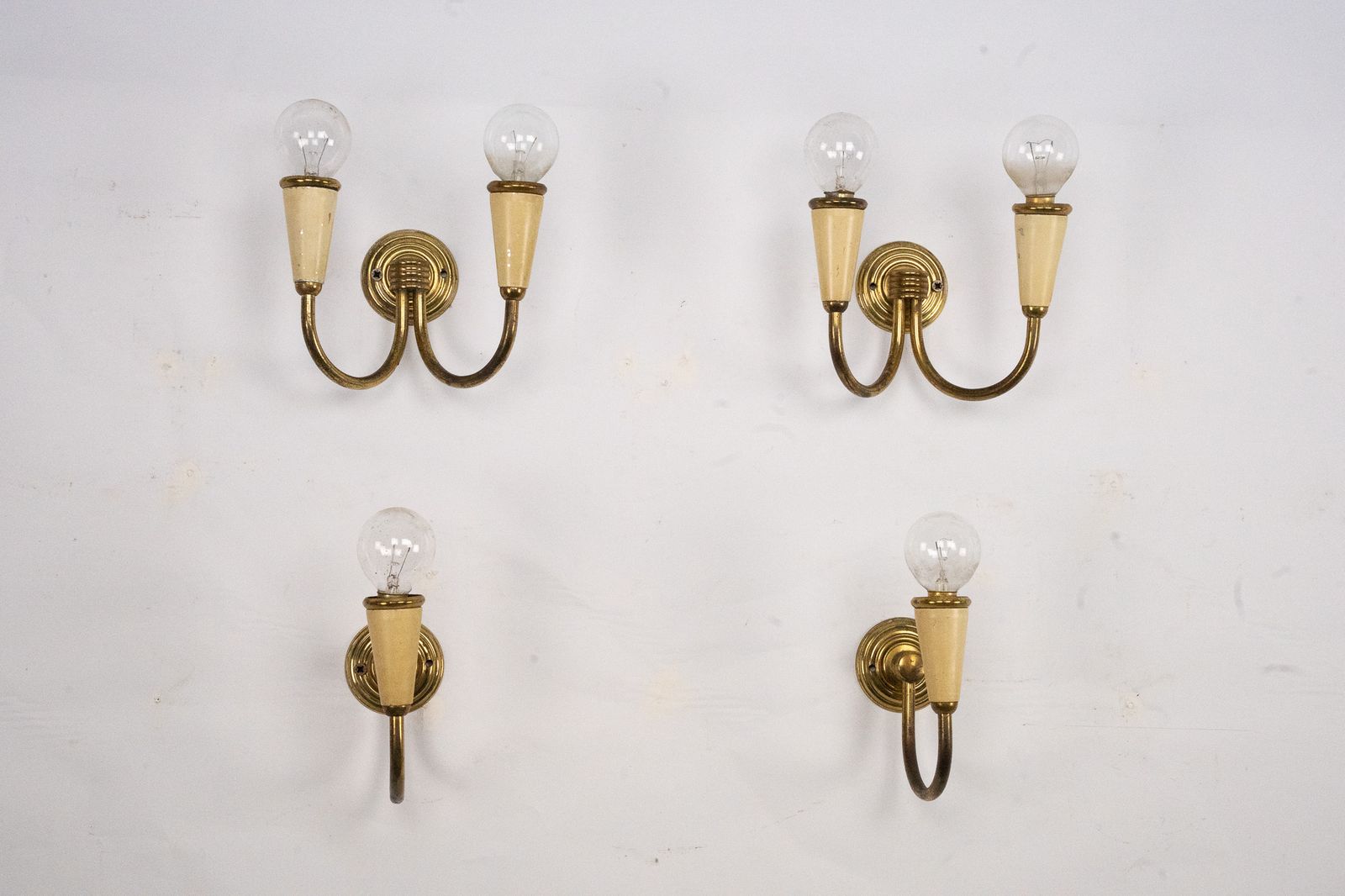 Set Of Four Mid Century Sconces In Lacquer And Brass. Italy 1950s