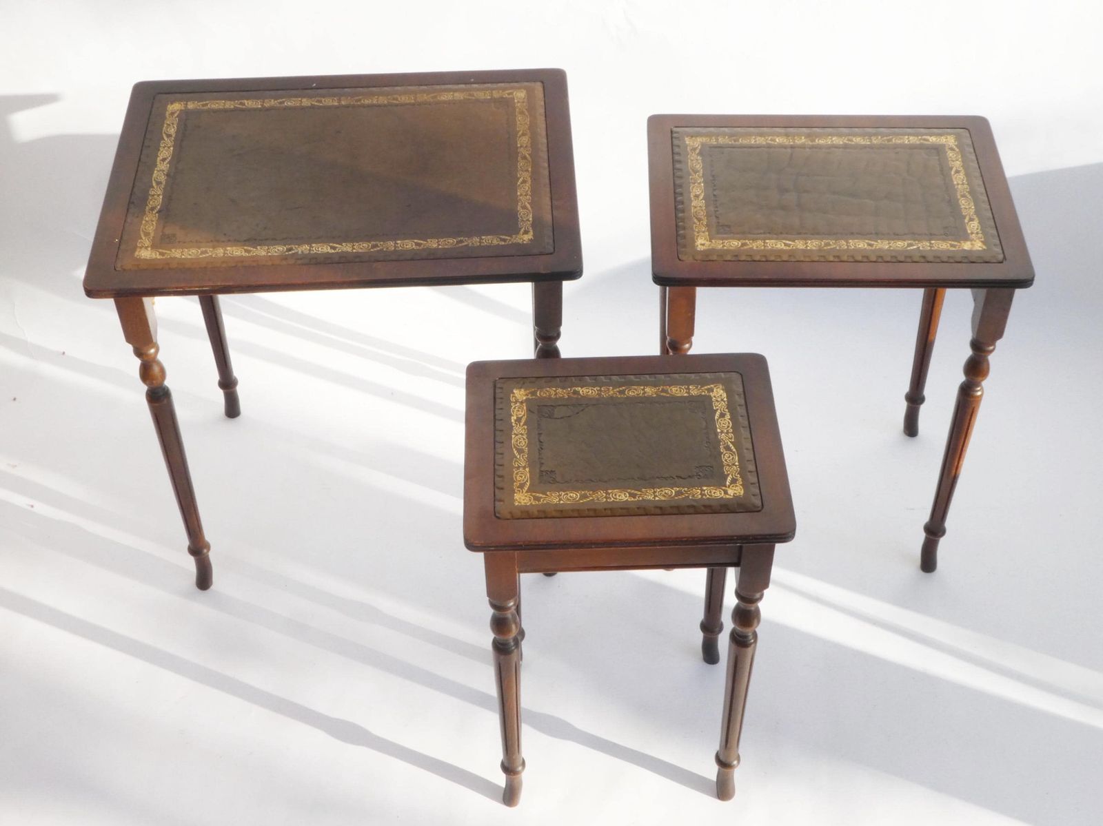 French Wooden Set Of Three Tables With Brown Inlaid Leather, Nesting Tables photo for sale