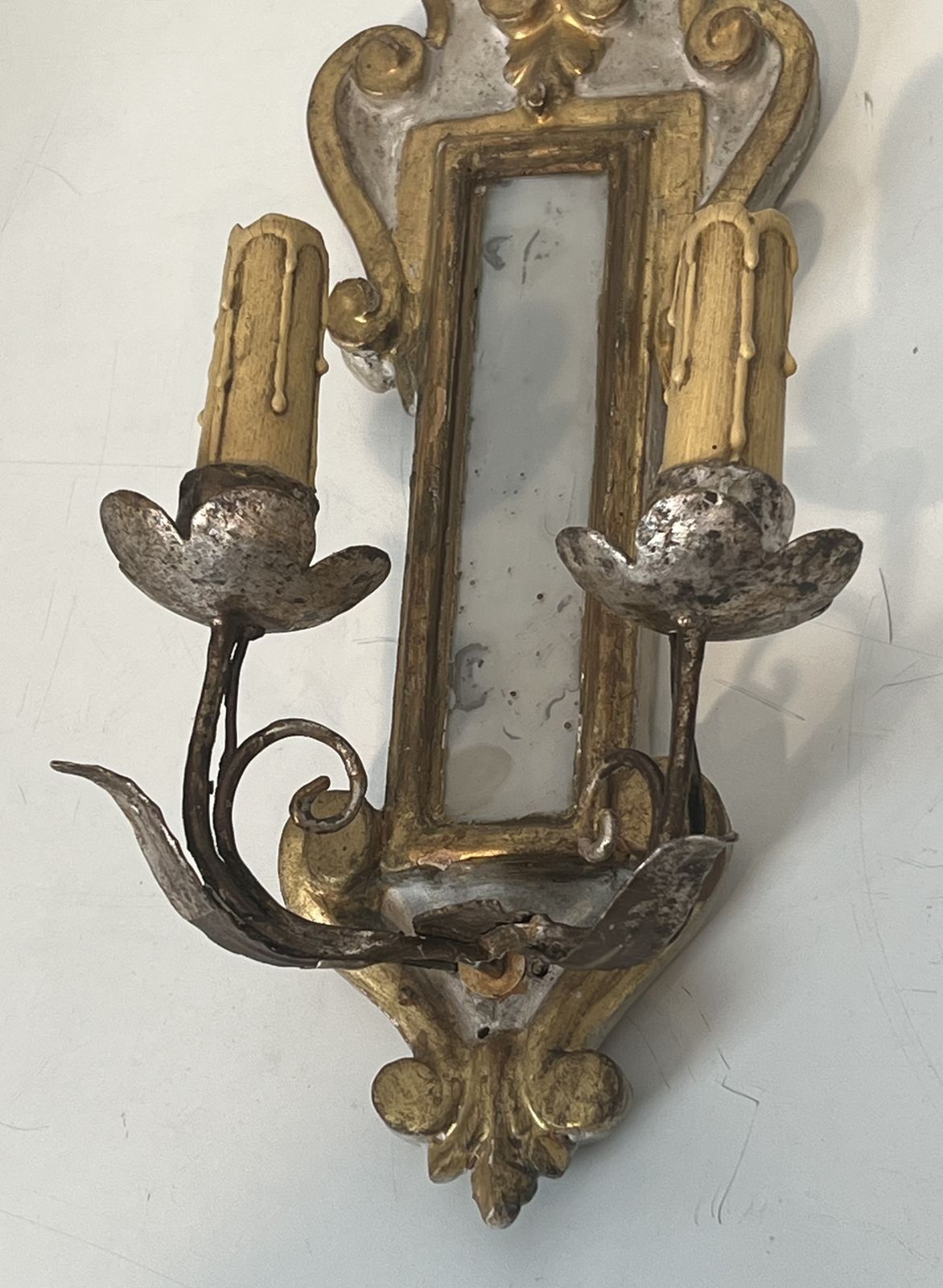 photo for sale Pair Of Wall Lights In Carved Wood And Silver And Gold Patinated Metal With A Mirror In The Center