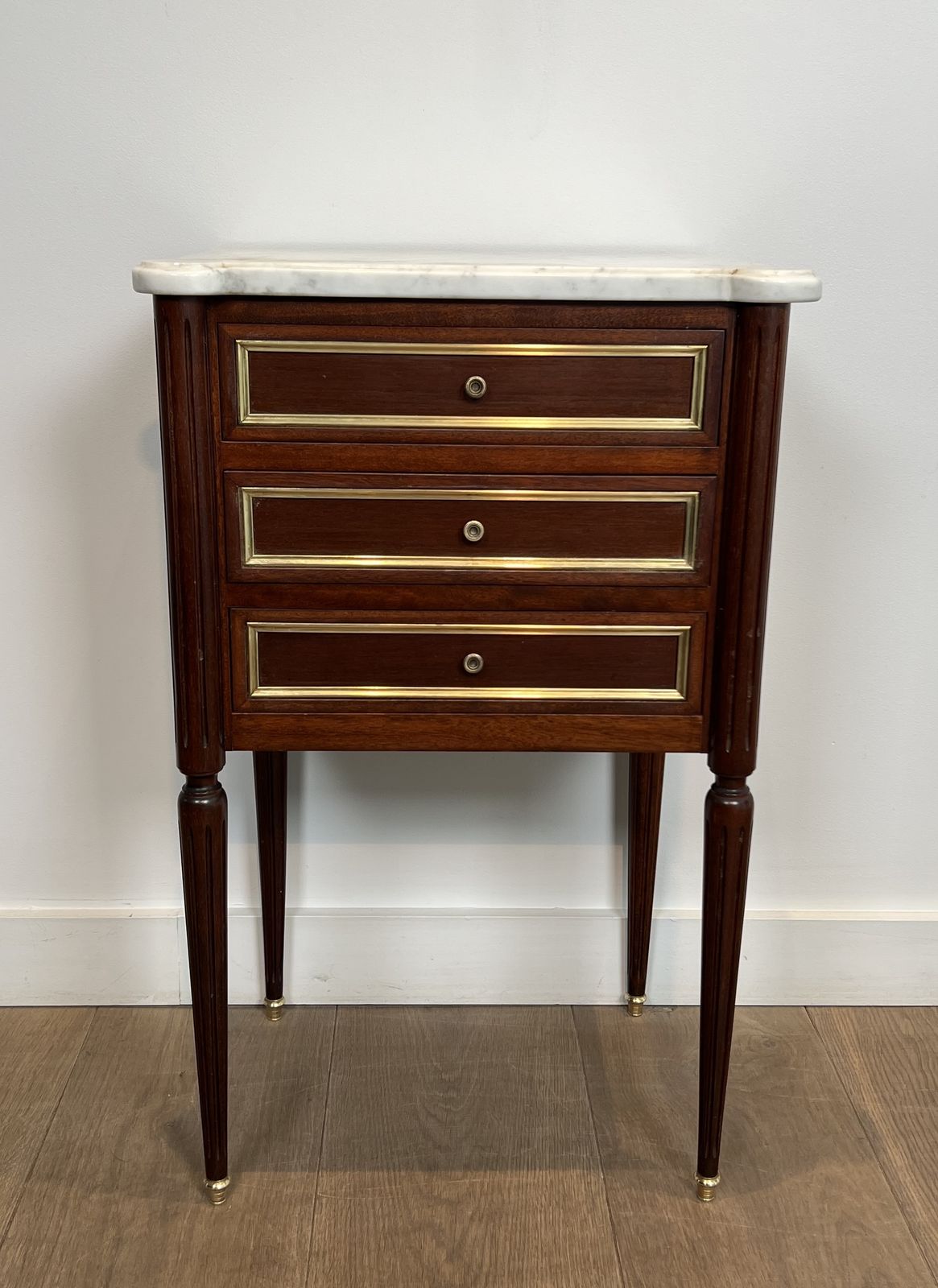 Pair Of Mahogany And Brass End Tables Or Bedside Tables With Carrara Marble Tops In The Style Of Maison Jansen. Circa 1940 photo vinterior