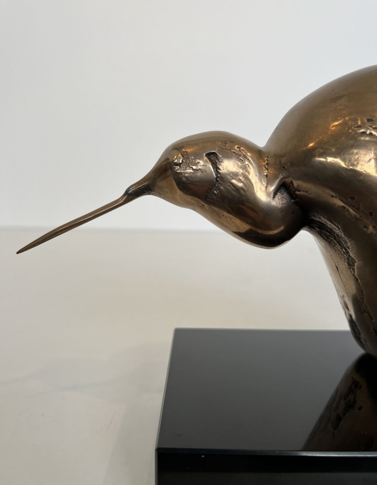 photo vintage Bronze Sculpture Representing A Stylized Bird On A Black Marble Base, Signed And Numbered
