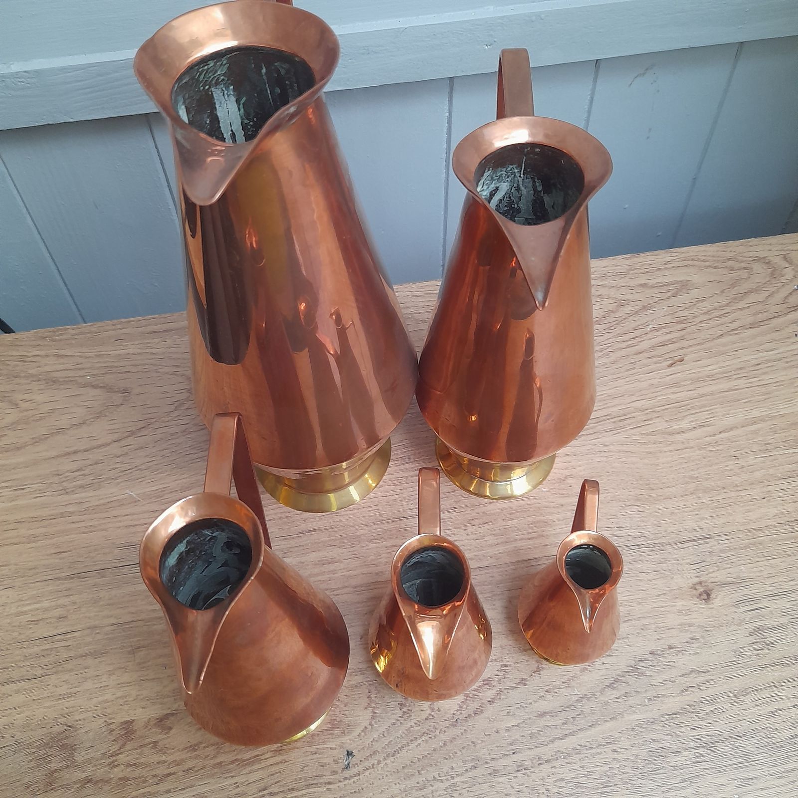 photo for sale Great Set Of 5 Brass And Copper Pitchers/Jugs