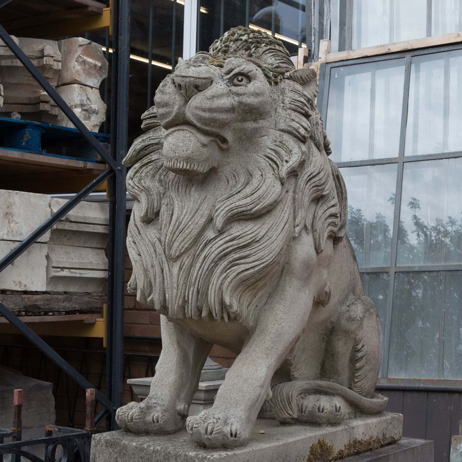 Reclaimed Pair Of Monumental Stone Lions On Their Own Plinth photo for sale