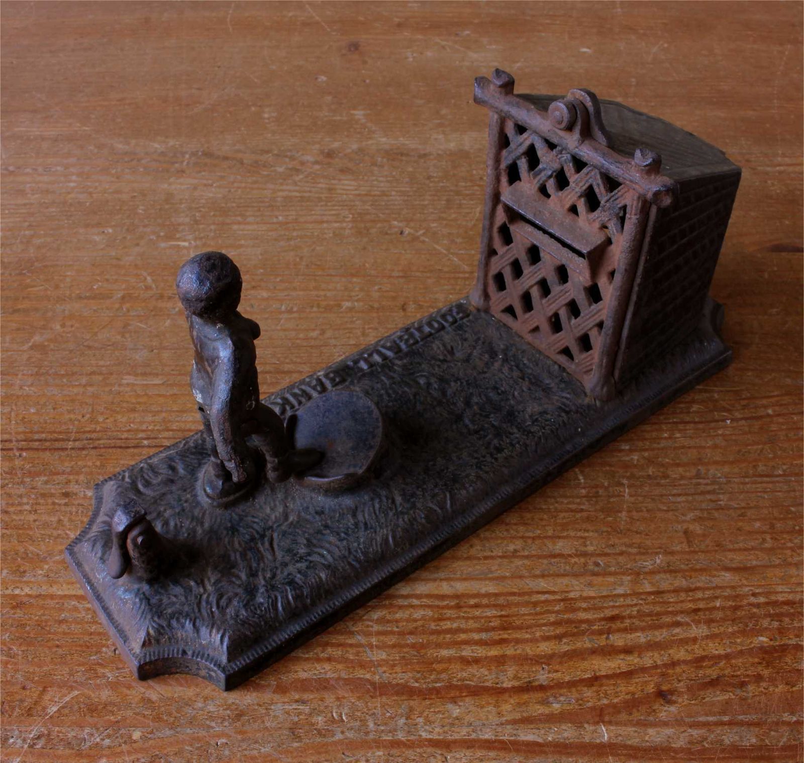 photo furniture Cast Iron Football Bank. Victorian Mechanical Money Box. John Harper Co.
