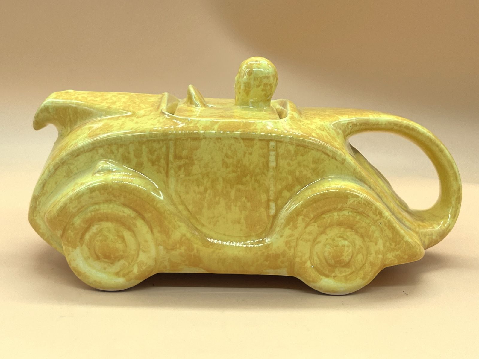 Art Deco Sadler Pottery Racing Car Tea Pot With Yellow Mottled Glaze.