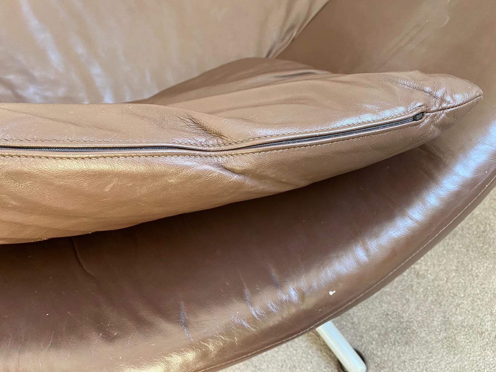 Gerard Van Den Berg “Gigi” Leather Swivel Chair From Heals. photo furniture