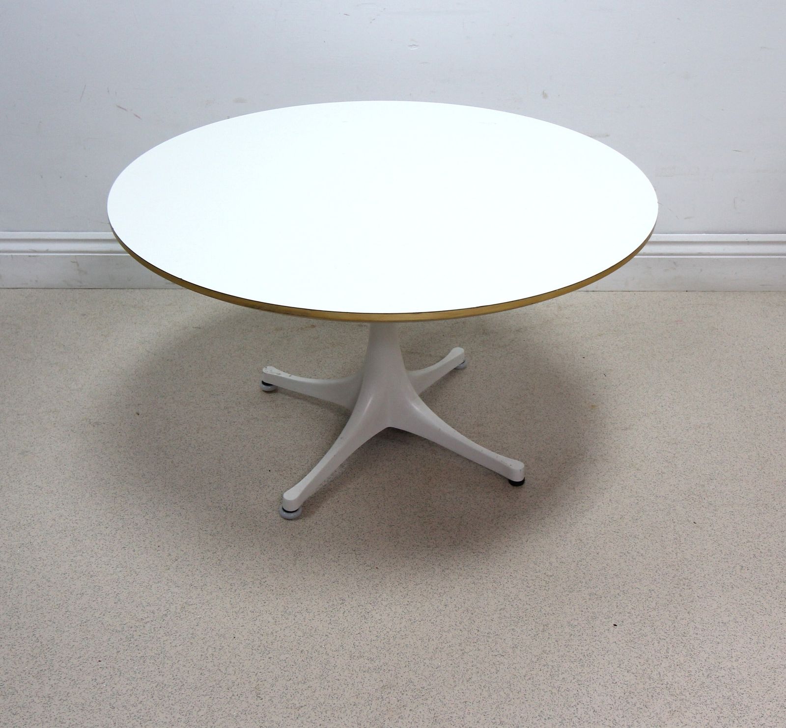 A Vitra Round White Pedestal Coffee Side Table By George Nelson photo furniture