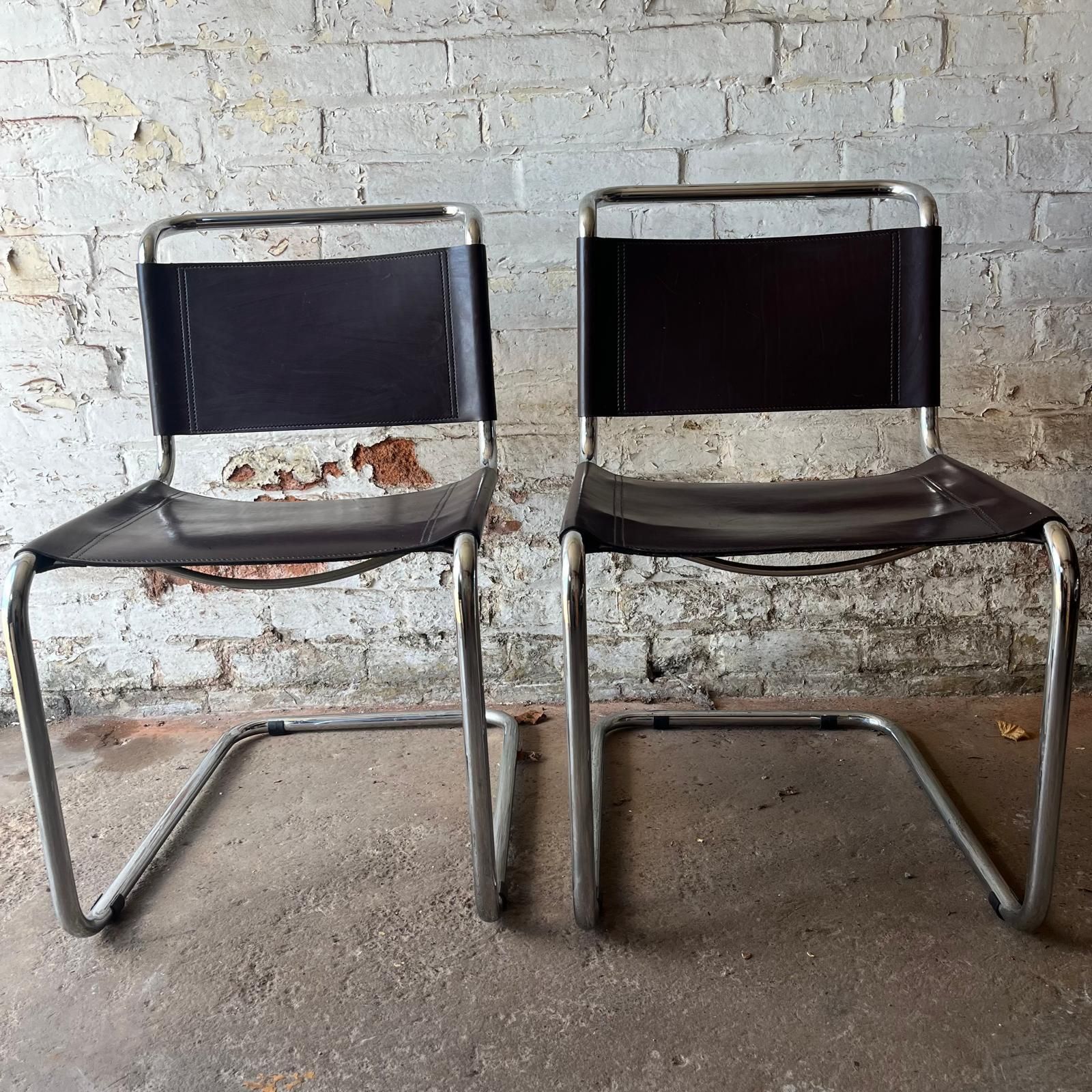 A Pair Of Chrome & Dark Brown Leather Cantilever Chairs photo furniture
