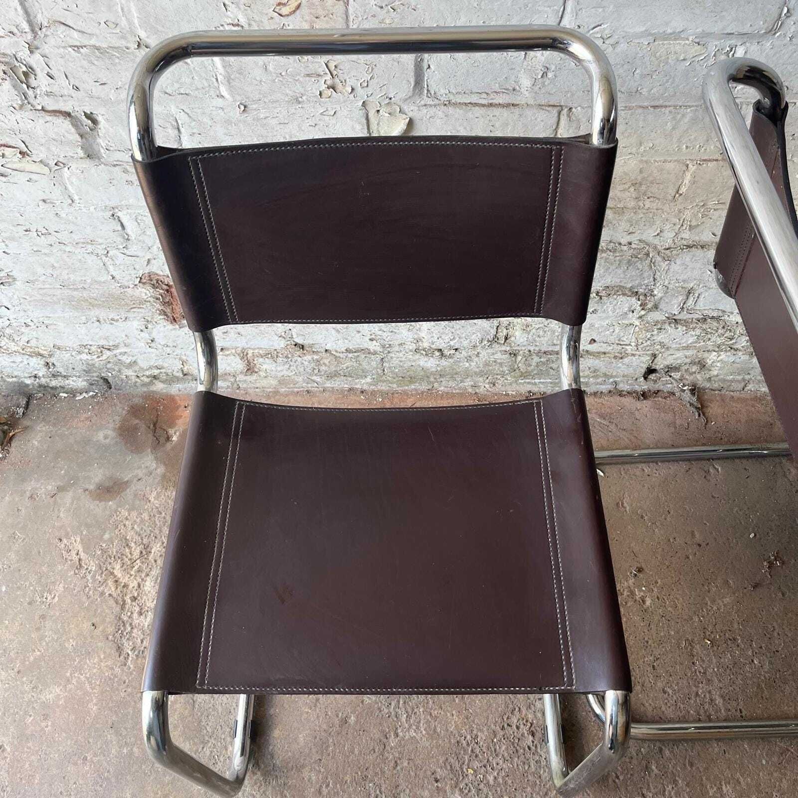 A Pair Of Chrome & Dark Brown Leather Cantilever Chairs photo 895.0