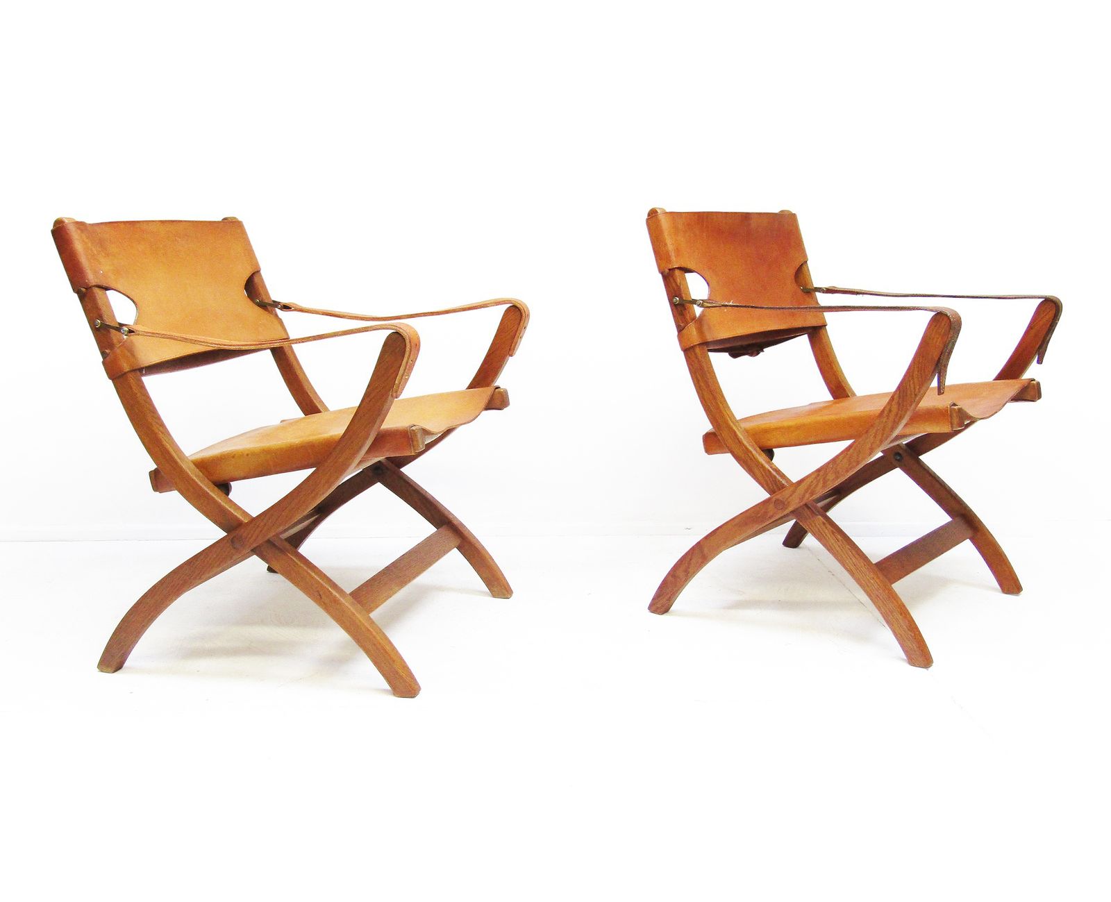 Two 1950s Danish Safari Chairs In Oak & Hide Leather By Poul Hundevad