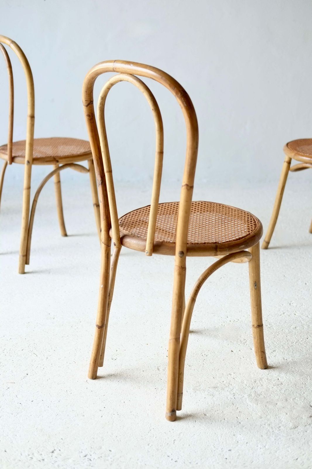 photo furniture A Set Of Four French Midcentury Bamboo Dining Chairs