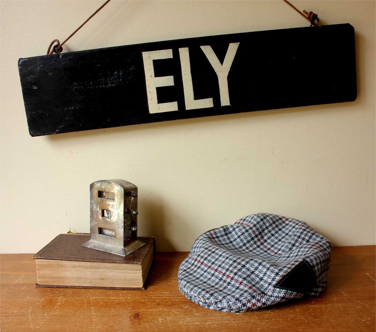 photo vintage Antique Ely Train Destination Sign. Black Railway Station Signage.