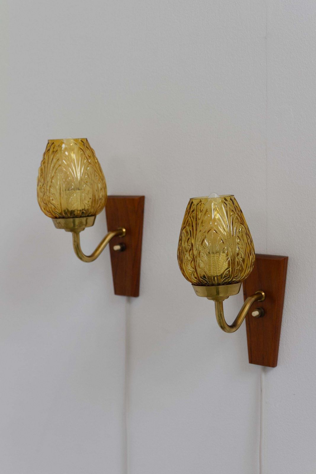 Danish Brass And Amber Glass Wall Sconces By Laoni, 1960s. Set Of 2. photo for sale
