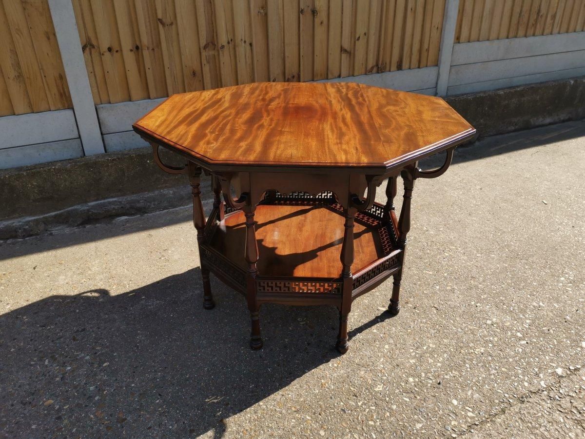 George Faulkner Armitage. An Aesthetic Movement Octagonal Mahogany Center Table photo furniture