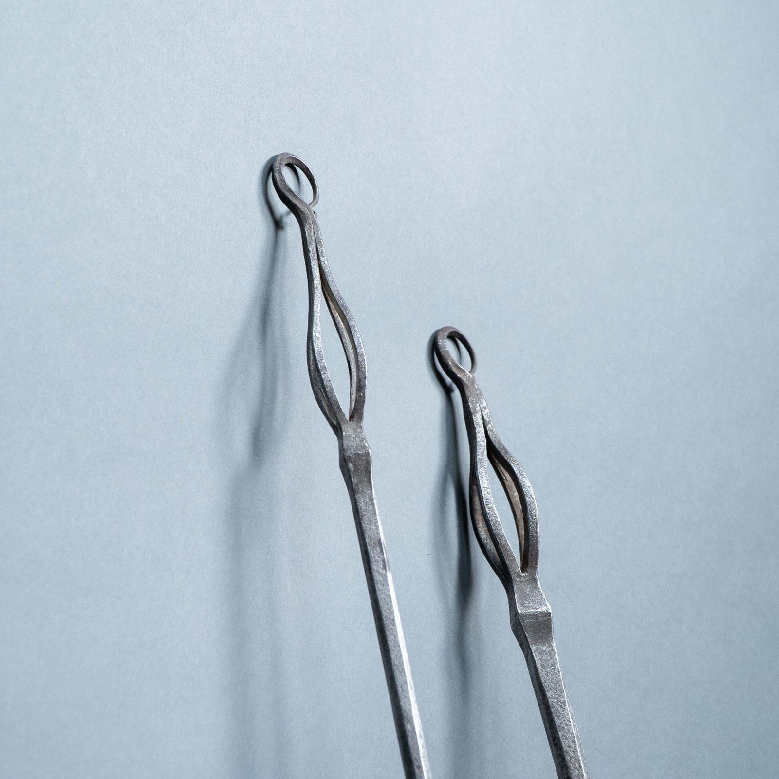 photo furniture A Pair Of Arts And Crafts Steel Fire Utensils