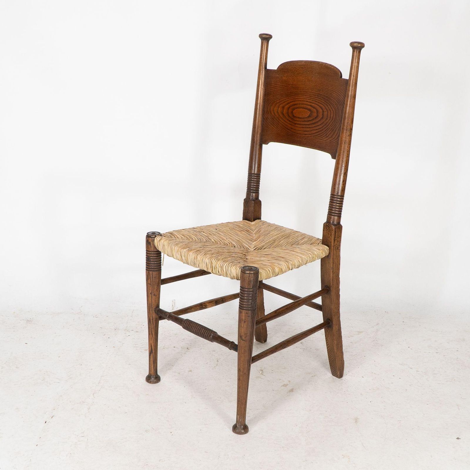William Birch For Liberty & Co. A Pair Of Arts & Crafts Rush Seat Oak Chairs photo 2200.0