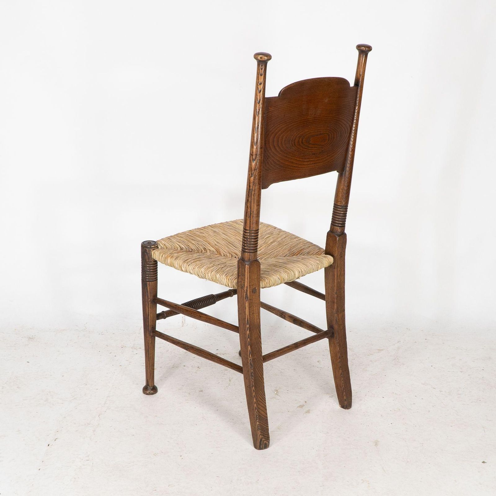 photo vintage William Birch For Liberty & Co. A Pair Of Arts & Crafts Rush Seat Oak Chairs