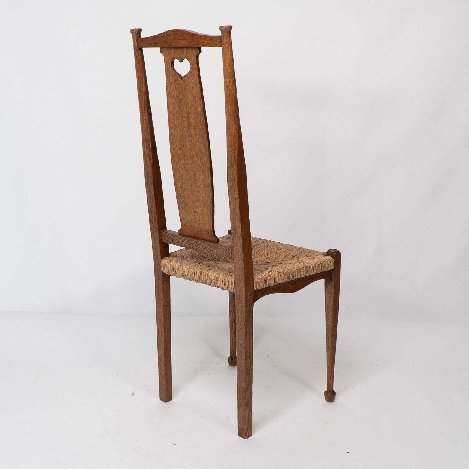 photo vinterior Ambrose Heals For Heals Of London. A Pair Of Arts And Crafts Rush Seated Chairs