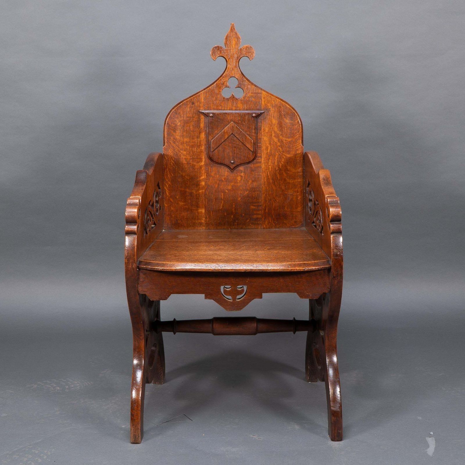 A High Gothic Revival Oak Armchair With Carved And Fretwork Sides photo furniture