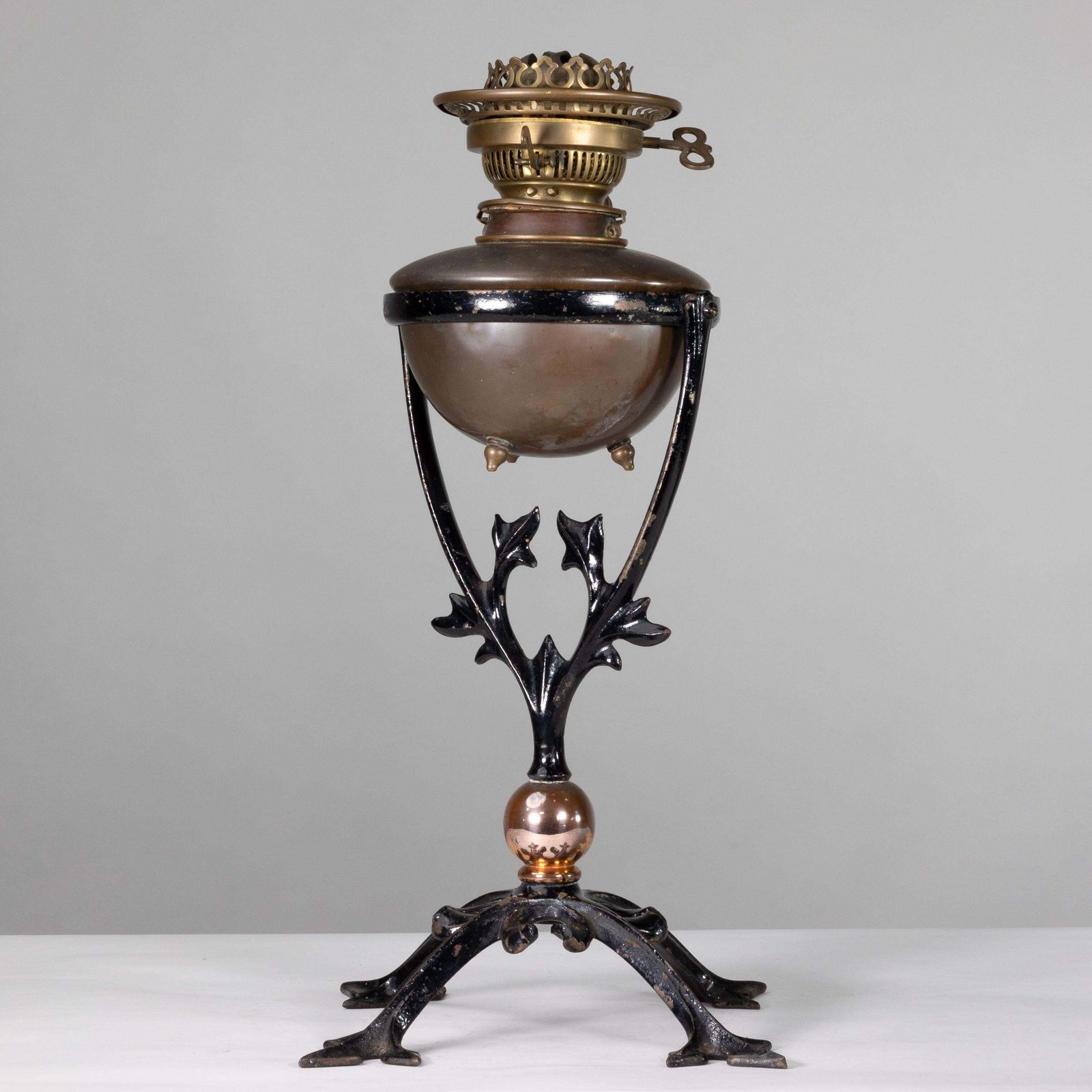 Was Benson. An Arts And Crafts Cast Iron Four Leg Table Oil Lamp photo furniture
