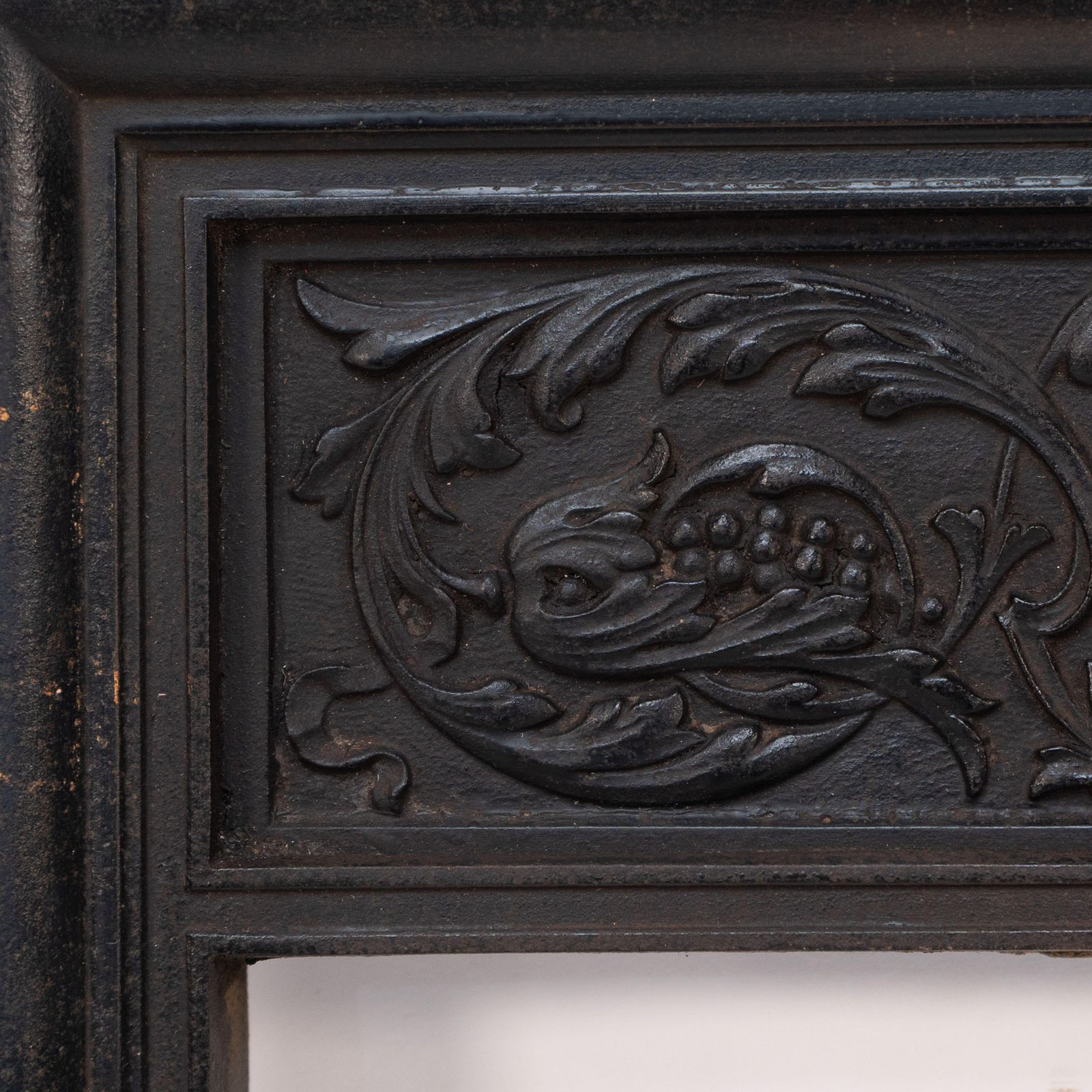 A Late Victorian Fireplace With Stylized Floral Details To The Top photo Home Fixtures