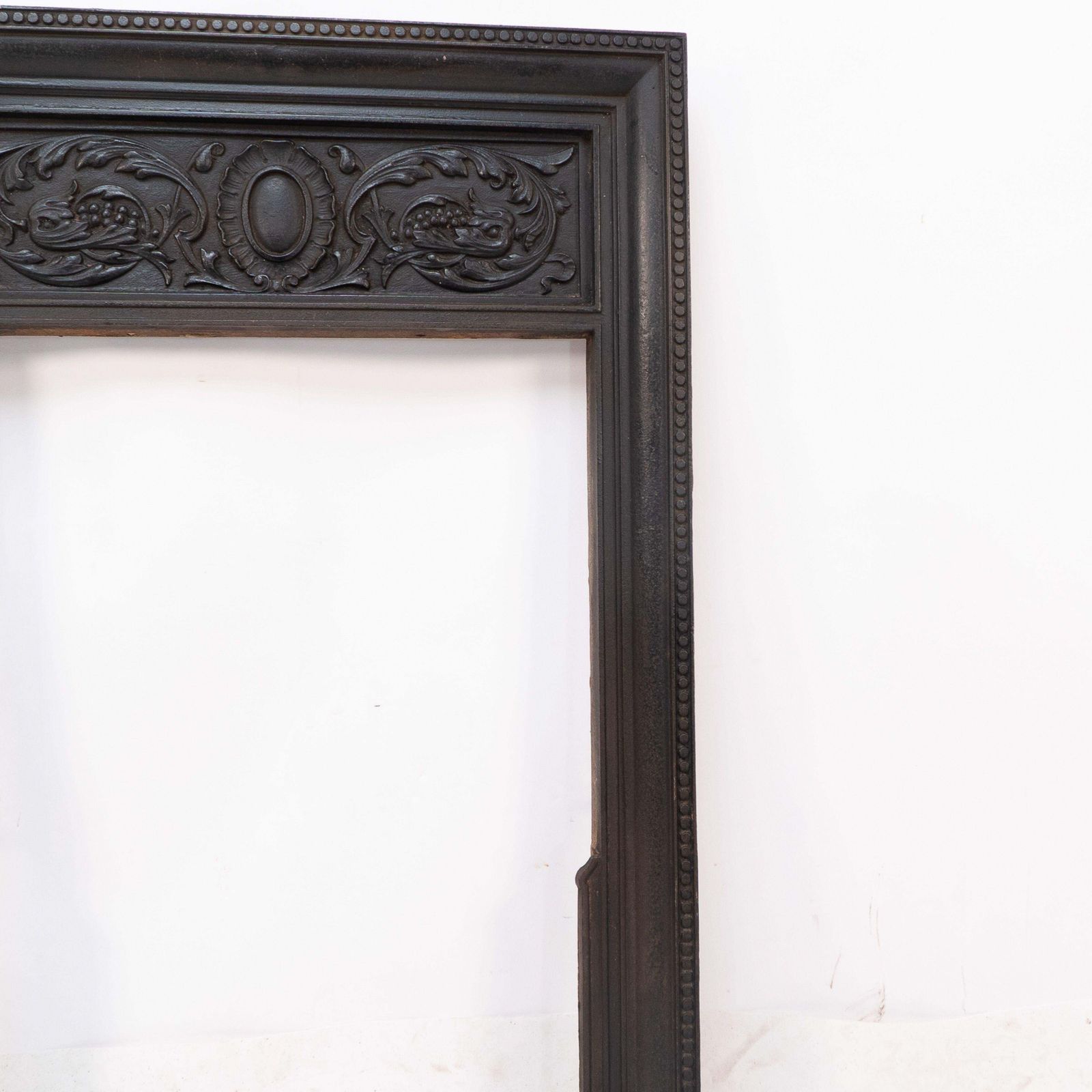 photo furniture A Late Victorian Fireplace With Stylized Floral Details To The Top