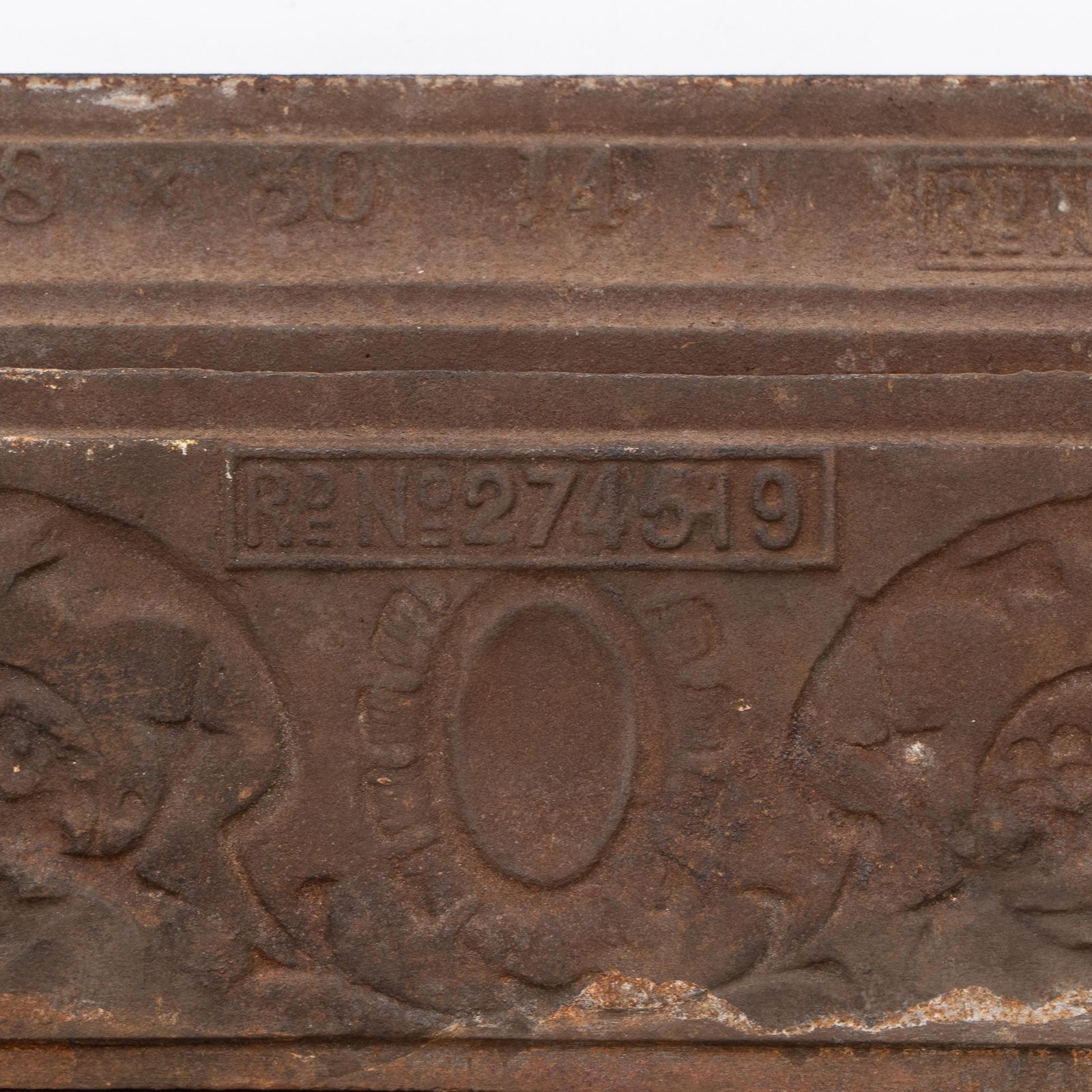 photo buy A Late Victorian Fireplace With Stylized Floral Details To The Top