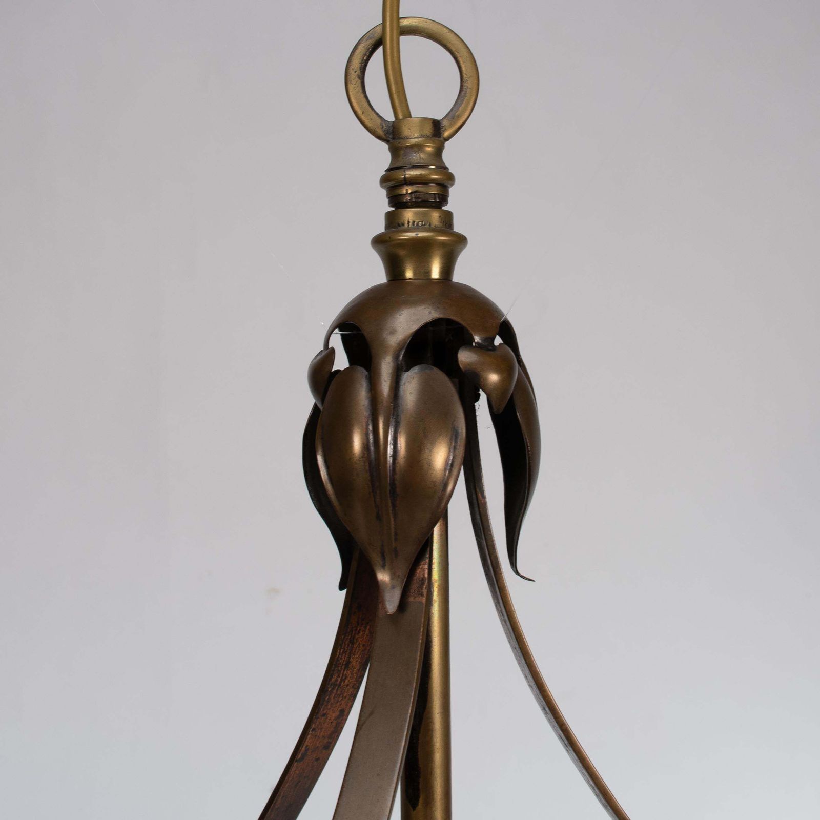 An Arts & Craft Ceiling Light With Stylized Petals & A Circular Brass Ring photo vinterior