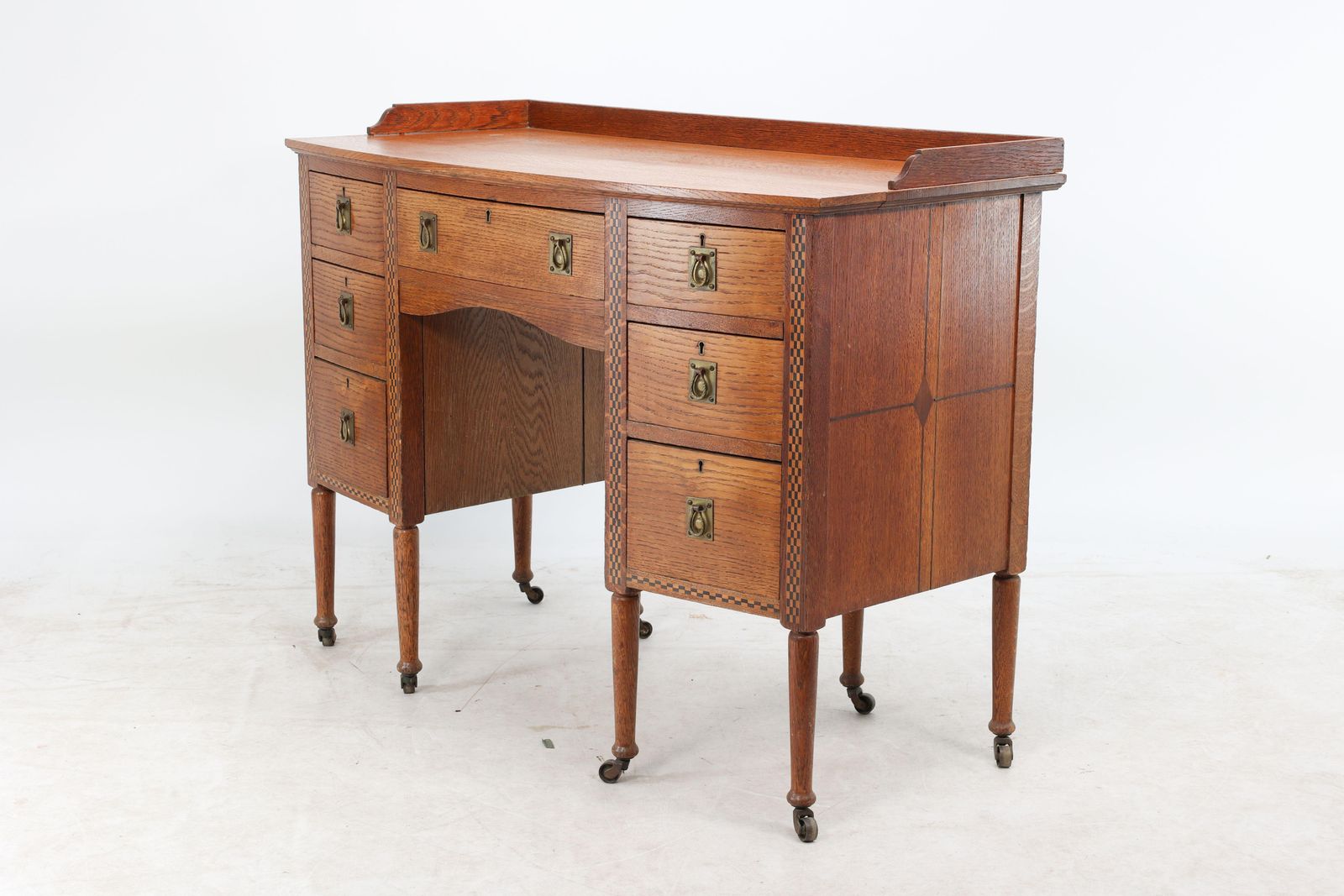 Waring And Gillow. An Arts And Crafts Bow Fronted Kneehole Twin Pedestal Desk photo Furniture