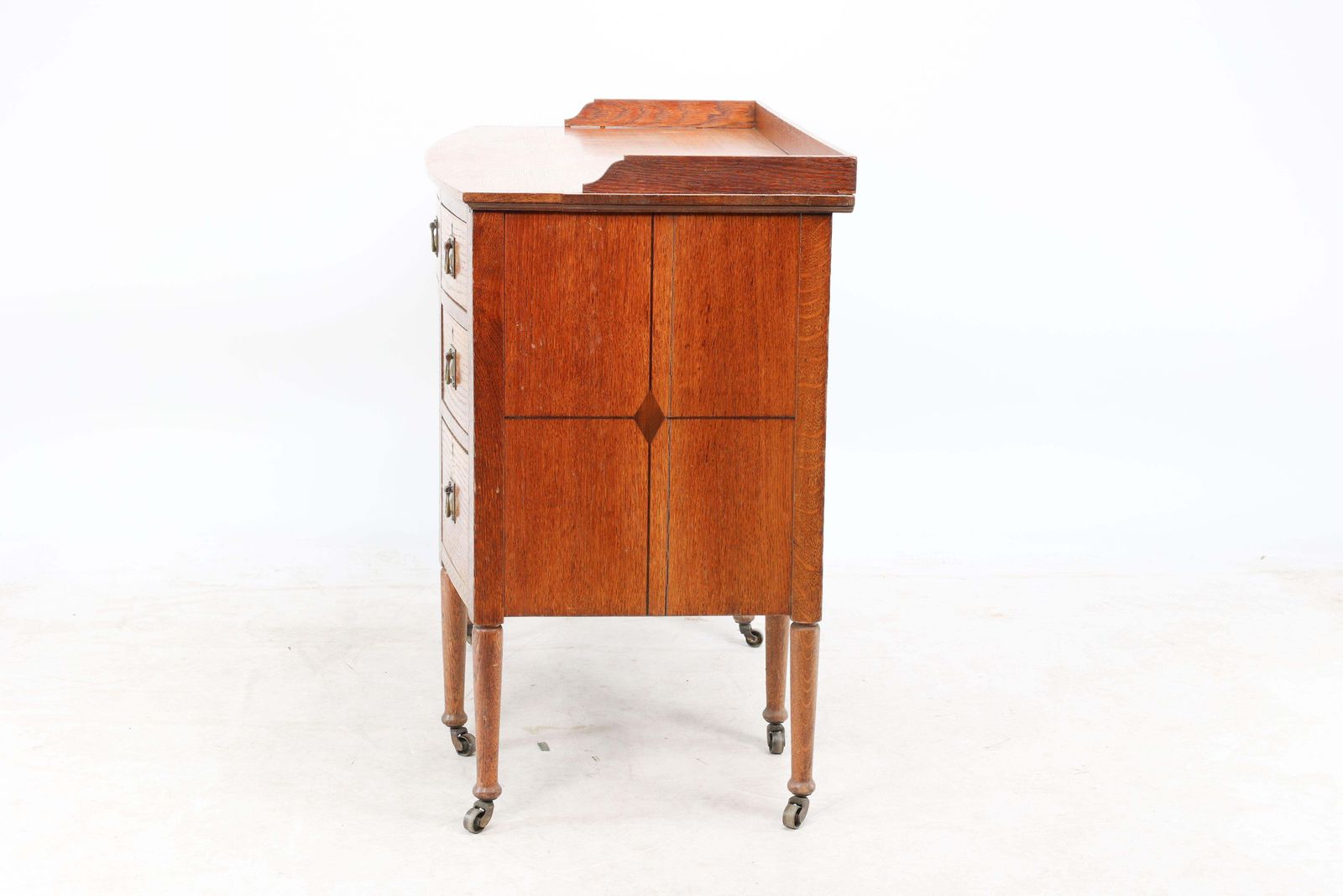 Waring And Gillow. An Arts And Crafts Bow Fronted Kneehole Twin Pedestal Desk photo 3264.0