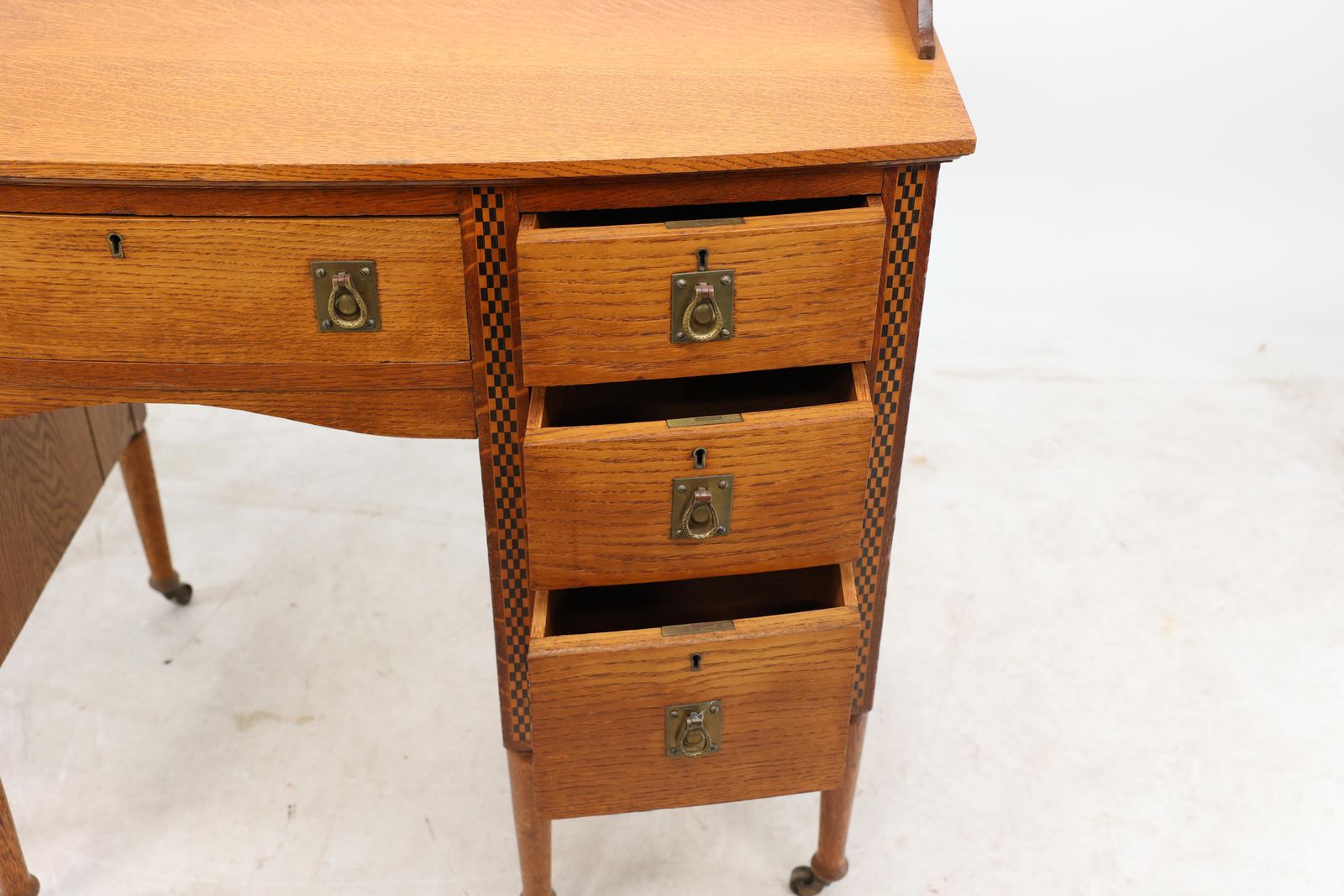 Furniture Waring And Gillow. An Arts And Crafts Bow Fronted Kneehole Twin Pedestal Desk photo