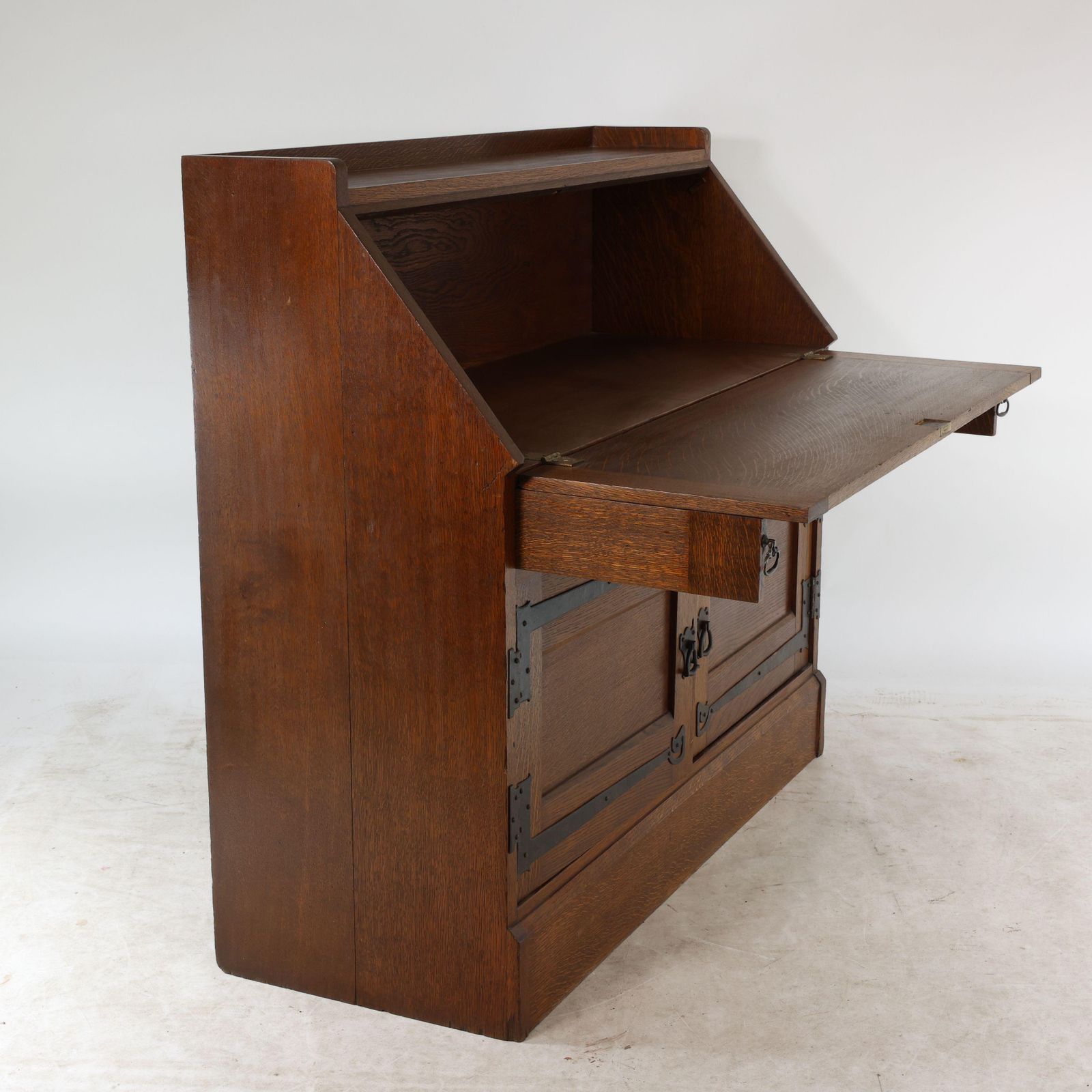 Leonard Wyburd For Liberty & Co. An Arts & Crafts Oak Bureau With Iron Hinges photo vinterior