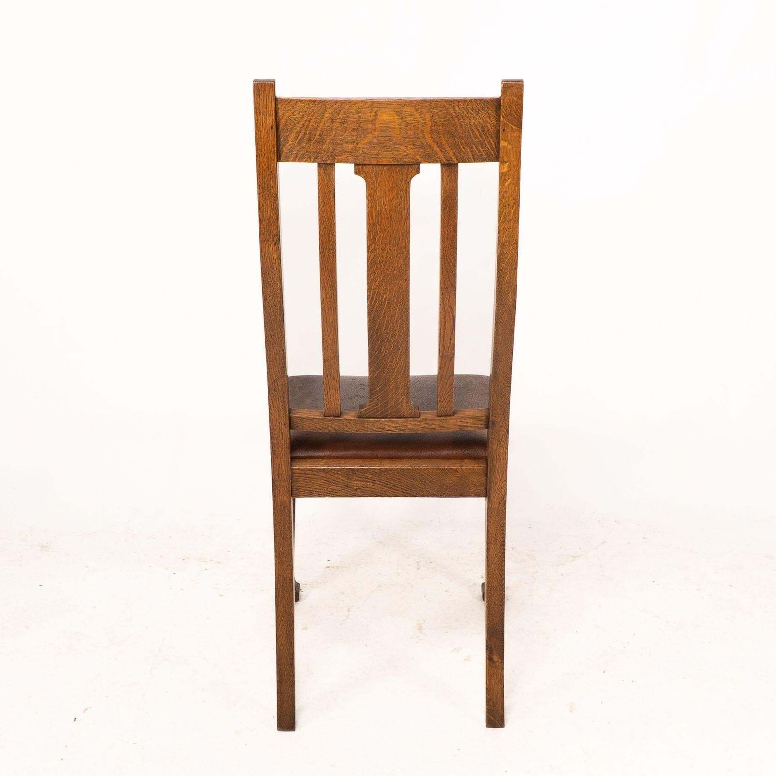 A Set Of Four Arts And Crafts Oak Dining Chairs With Comfortable Shaped Backs photo vintage