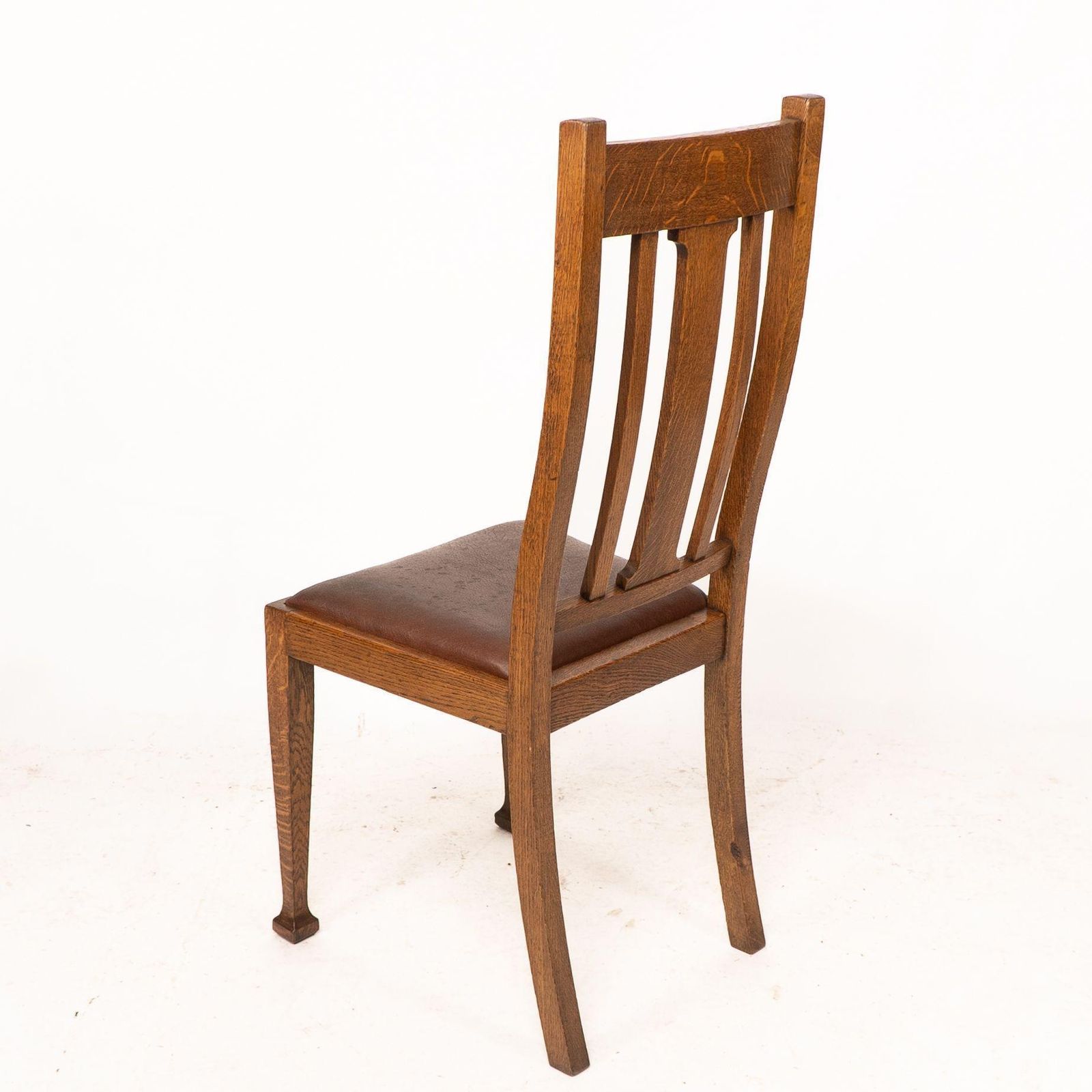 photo furniture A Set Of Four Arts And Crafts Oak Dining Chairs With Comfortable Shaped Backs